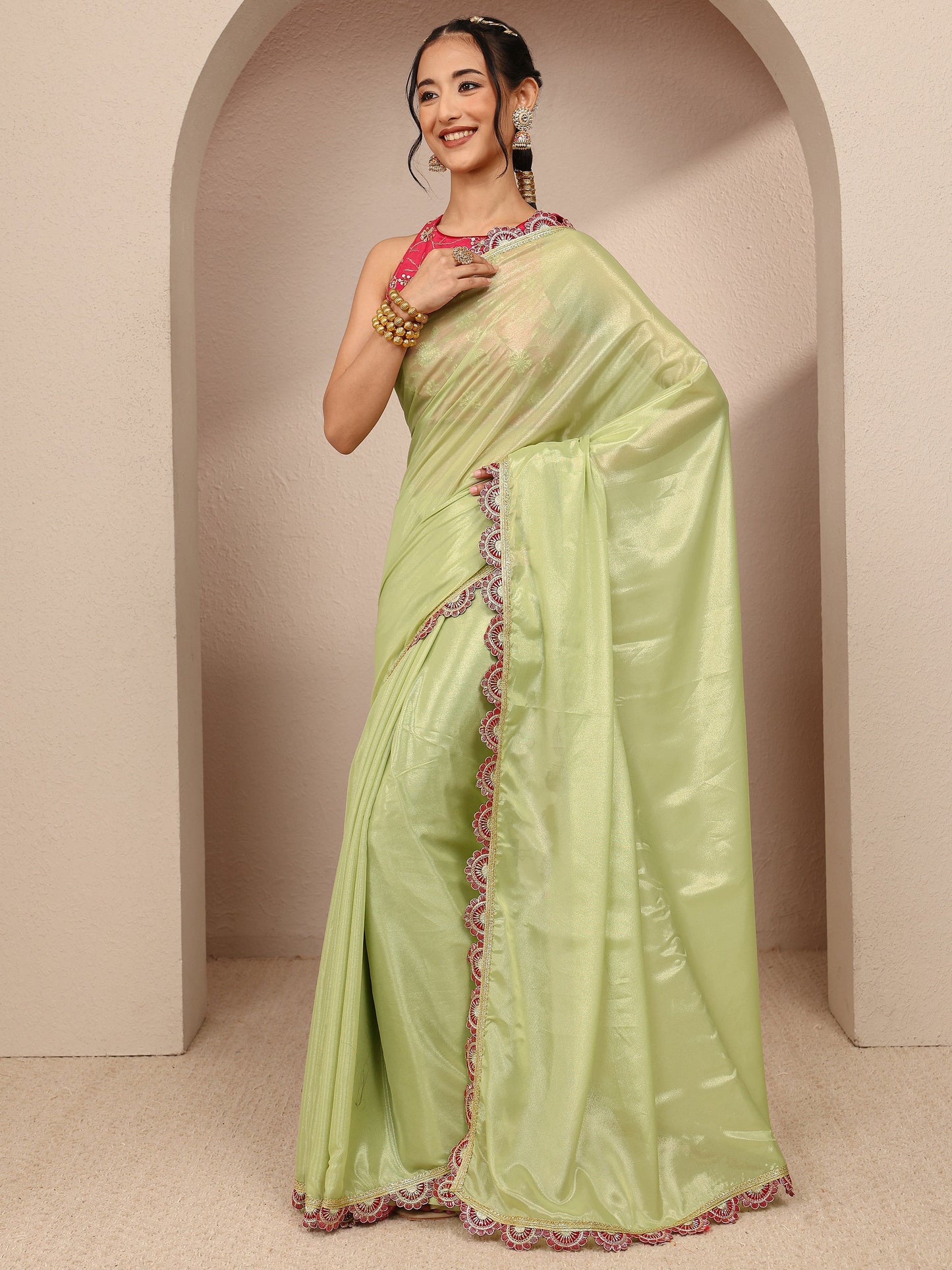 Libas Green Solid Tissue Saree With Unstitched Blouse Piece