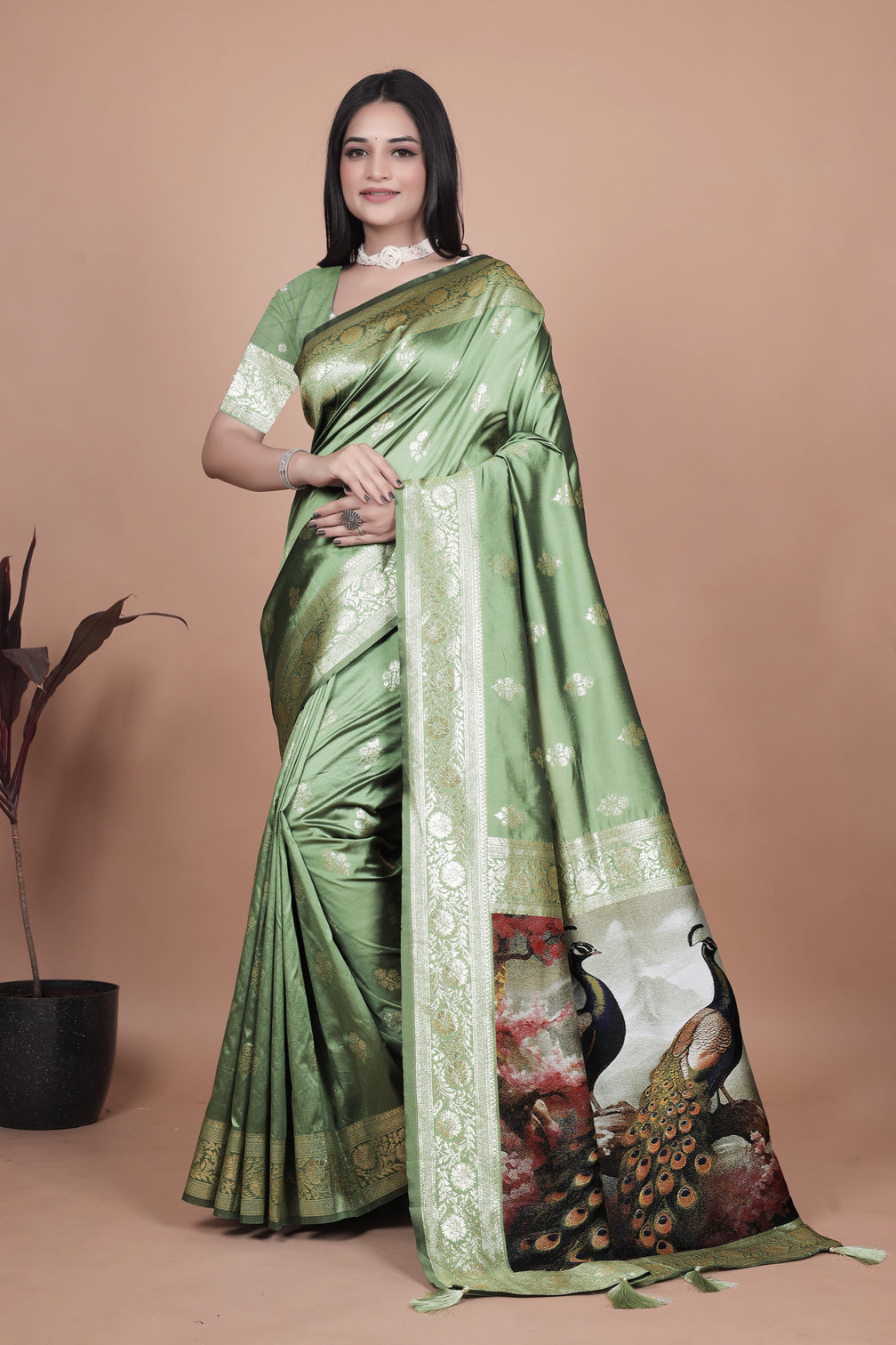 Elegant Green Silk Saree with Peacock Design and Golden Border