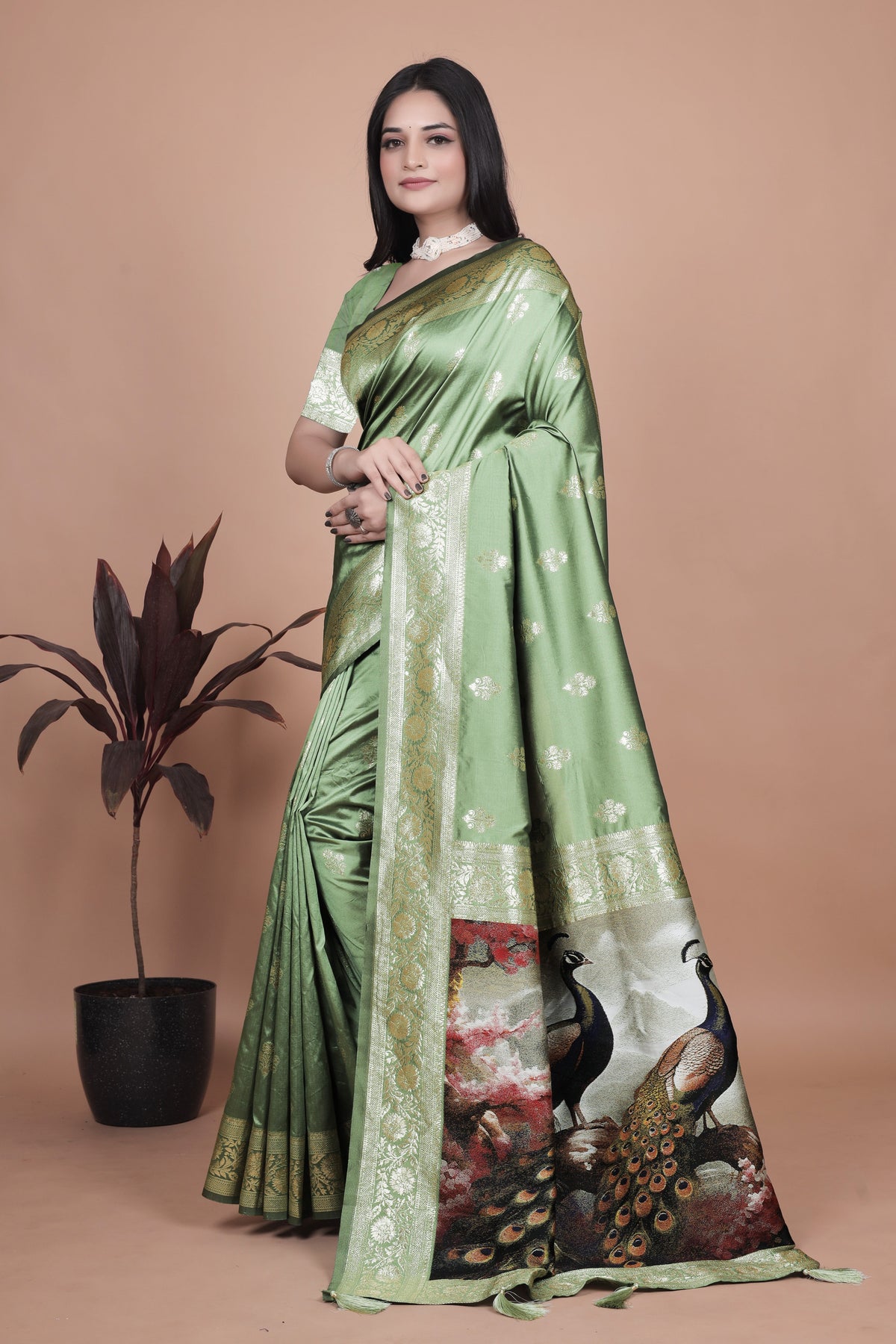 Elegant Green Silk Saree with Peacock Design and Golden Border