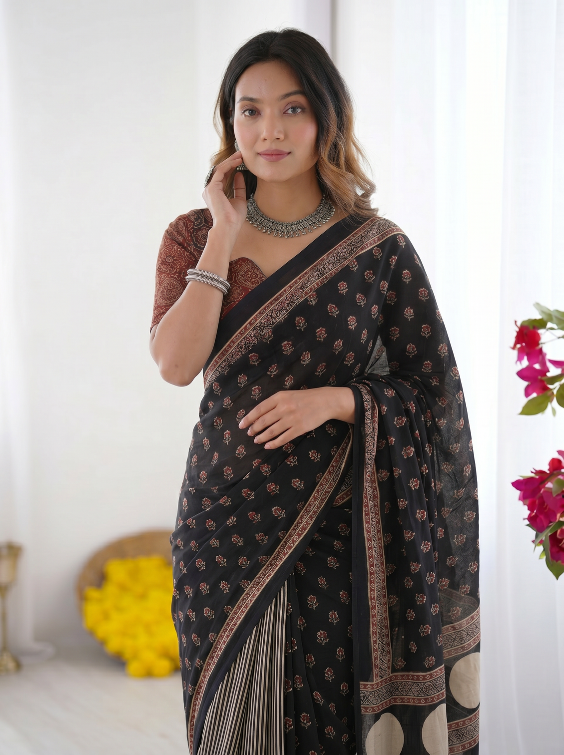 Black modal silk saree with floral butti prints striped pleats statement geometric designer pallu