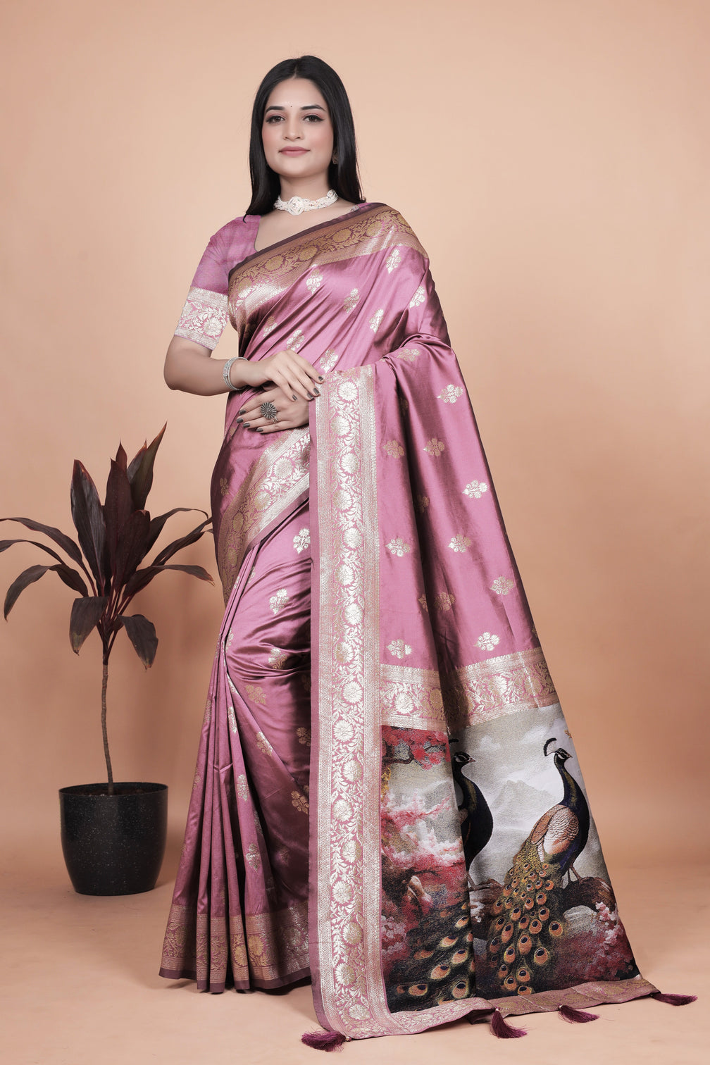 Graceful Lilac Saree with Intricate Golden Border and Peacock Art