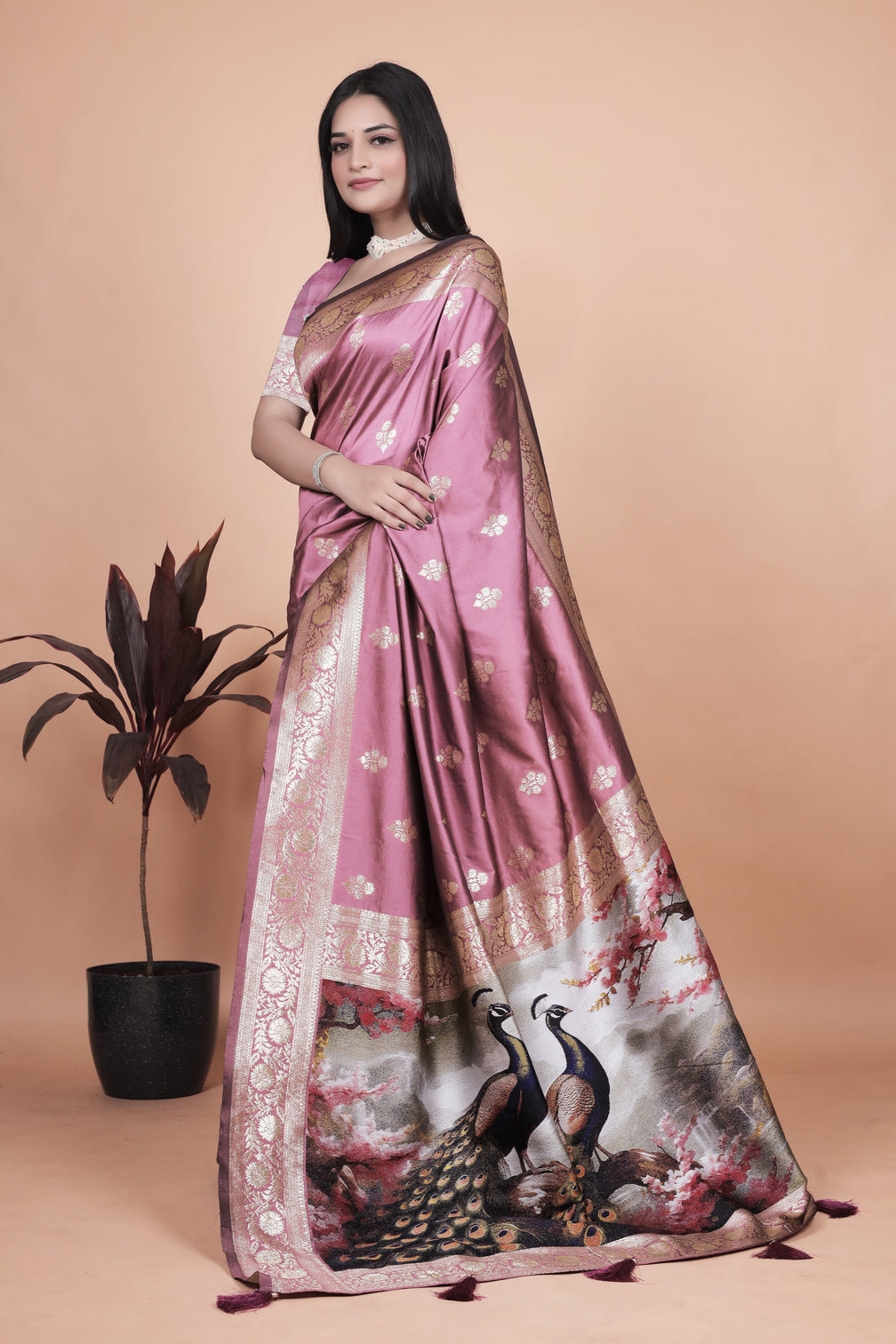 Graceful Lilac Saree with Intricate Golden Border and Peacock Art