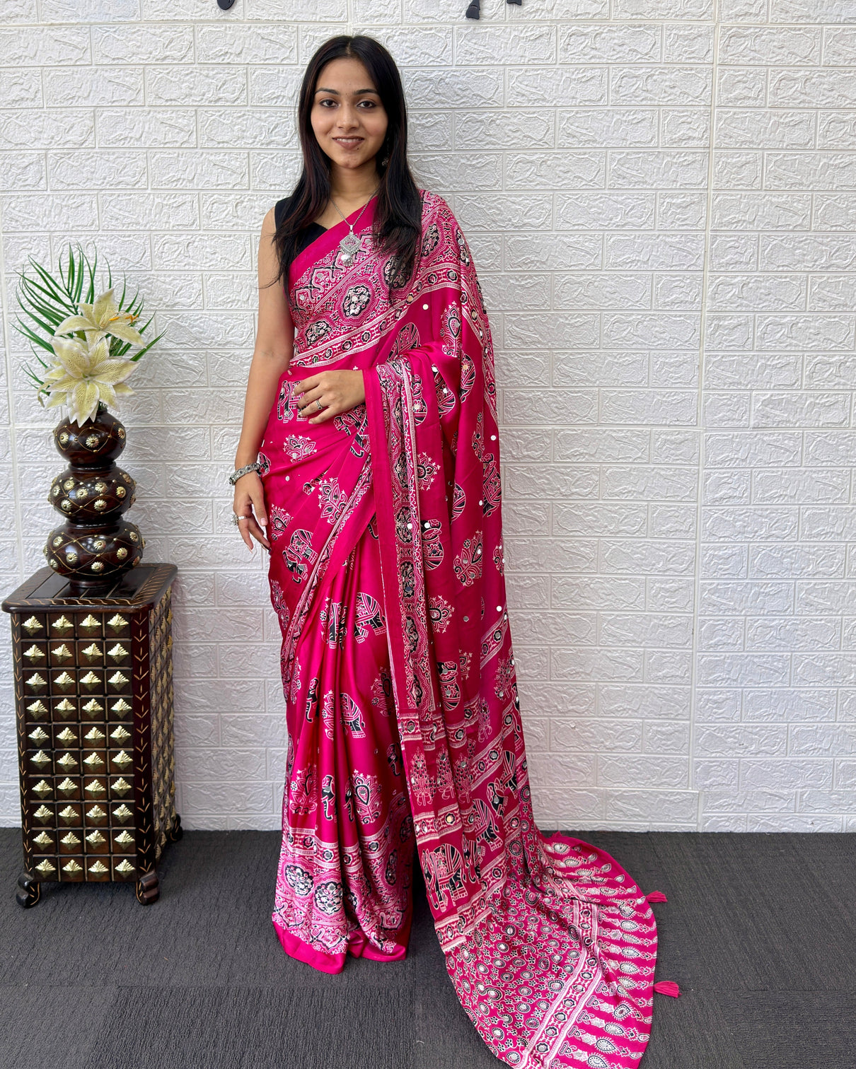 Rani pink modal silk saree with elephant motif ajrakh print designer pallu festive ethnic wear saree