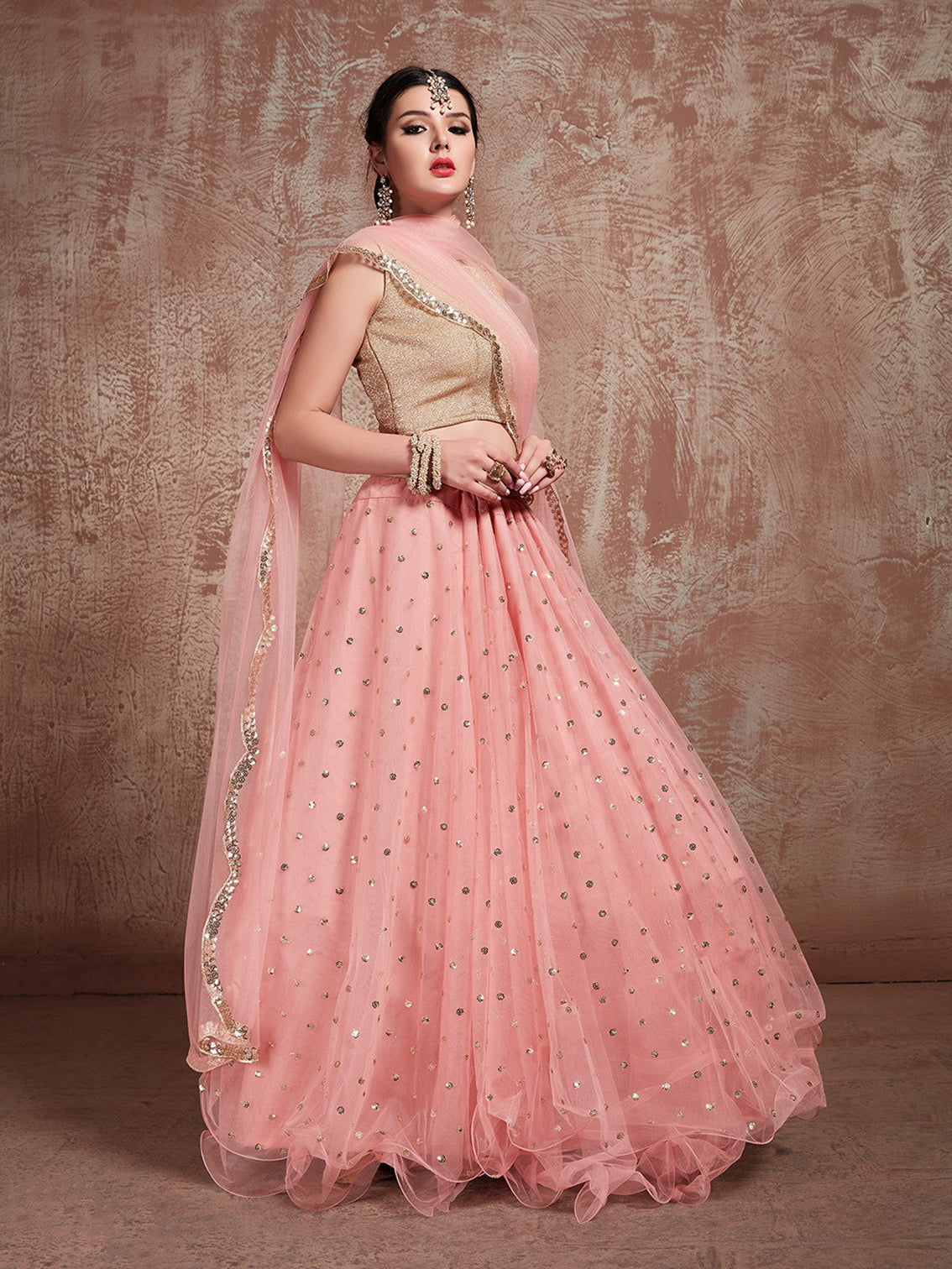 Peach Soft Net Sequins Semi Stitched Lehenga With Unstitched Blouse