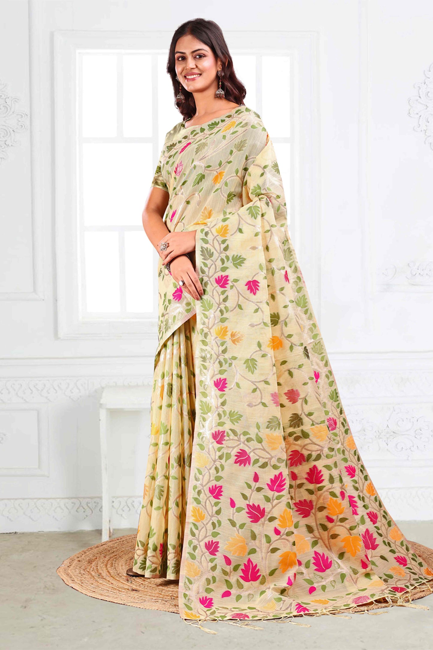 Cream Linen Cotton Silk  Saree Enhanced With Floral Zari Weaving & Tasselled Pallu Finish