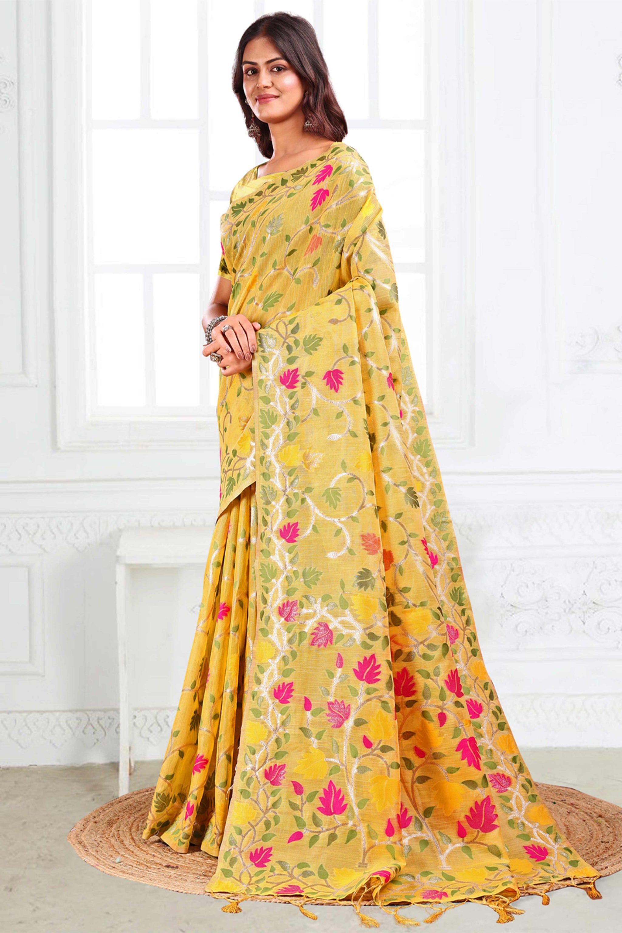 Yellow Linen Cotton Silk  Saree Enhanced With Floral Zari Weaving & Tasselled Pallu Finish