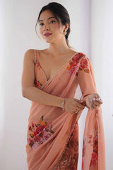 Partywear Peach Georgette Saree with Floral Prints and Bead Work Lace