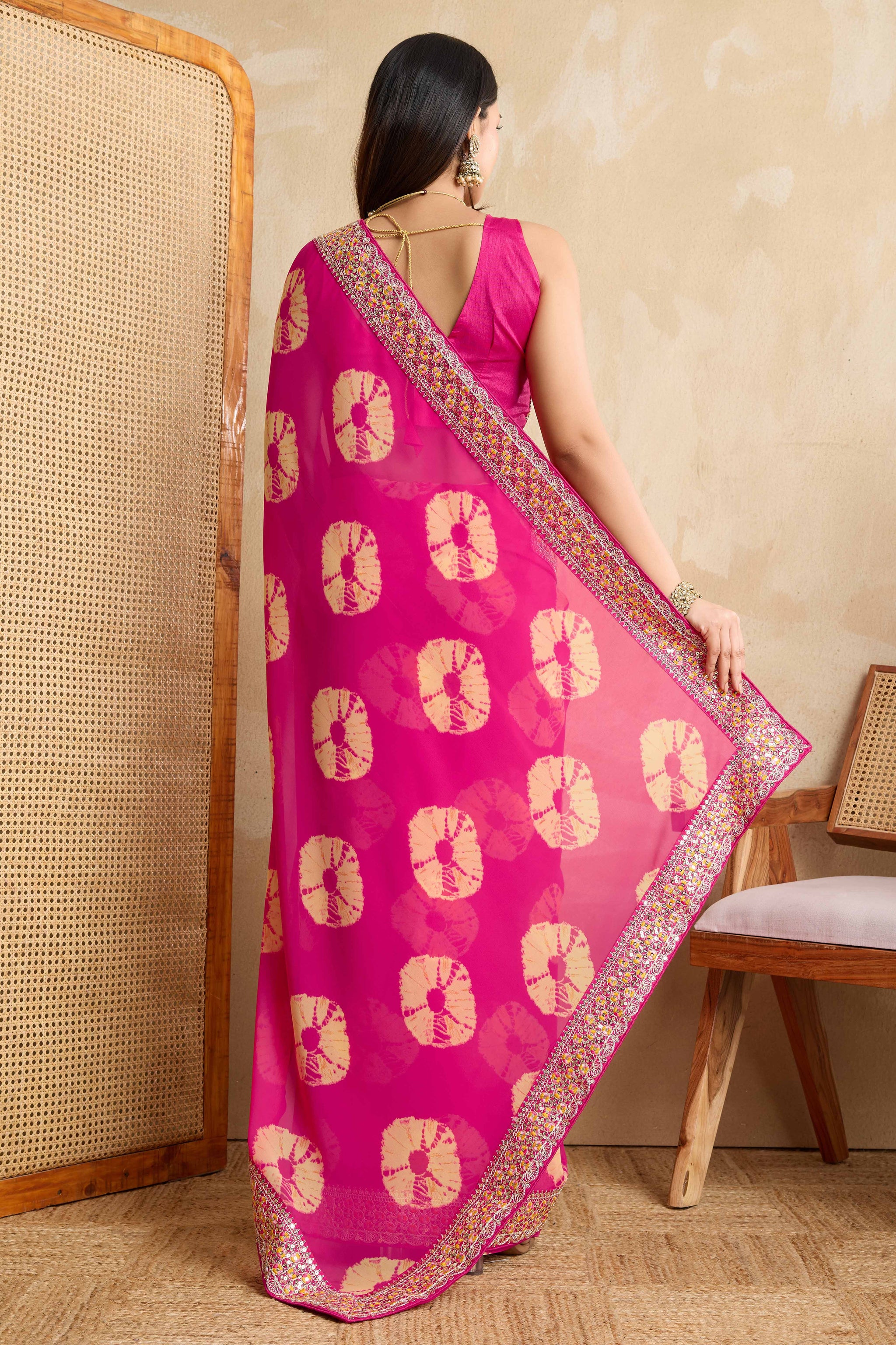 Pink Georgette Saree with Contemporary Tie-Dye Patterns and Classic Lace Work Finish