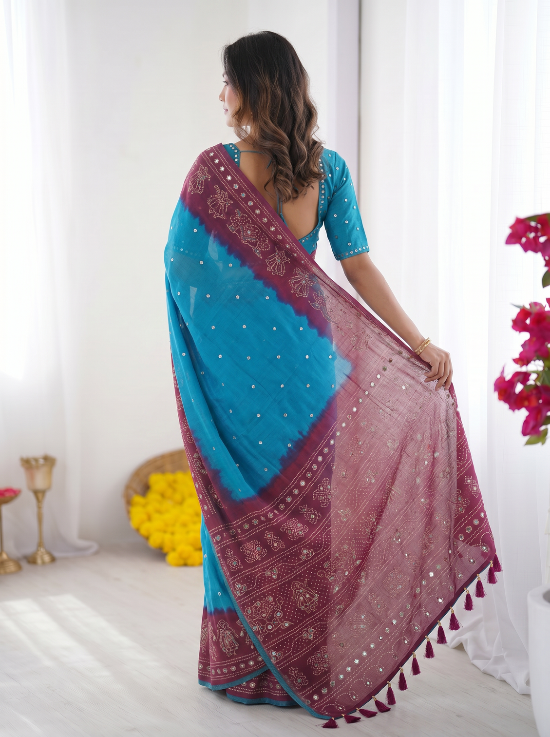 Sky blue wine purple bandhani printed cotton silk saree with traditional folk border tassel pallu