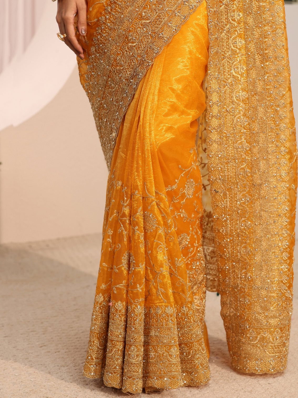 Mameraa Mustard Floral Embellished Net Saree With Unstitched Blouse Piece