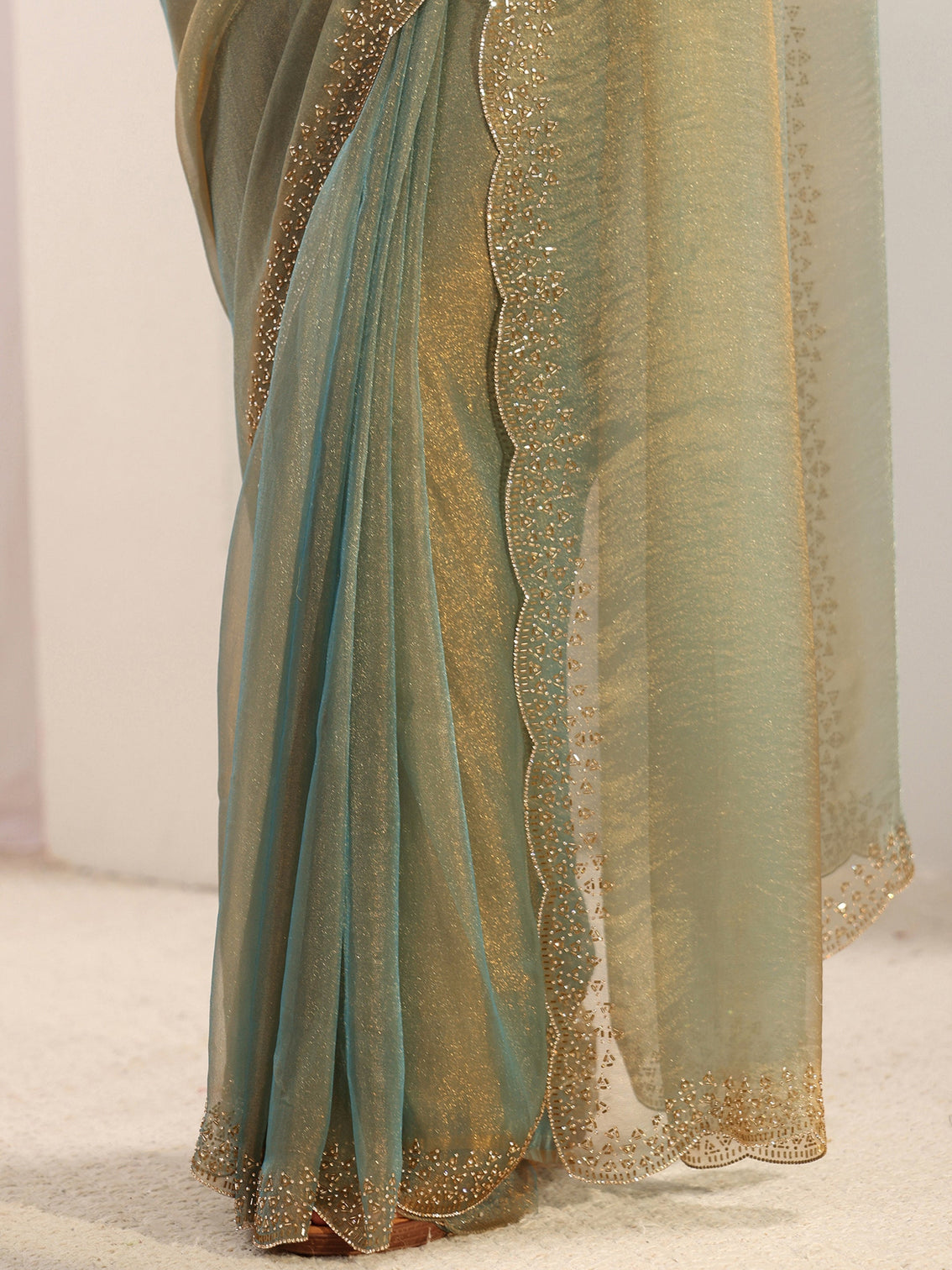 Mameraa Green Embellished Border Tissue Saree With Unstitched Blouse Piece
