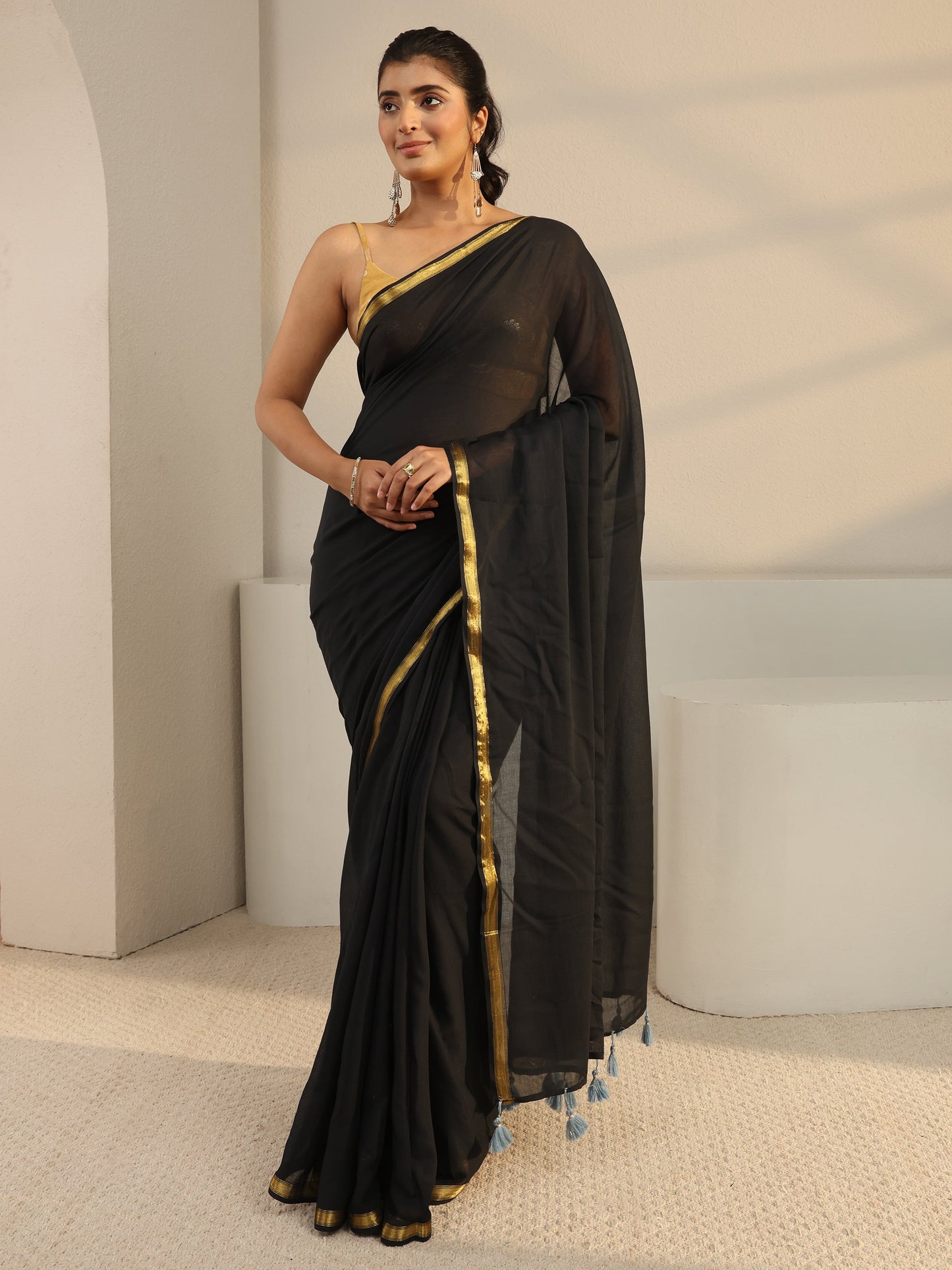 Libas Black Solid Cotton Tassel Saree