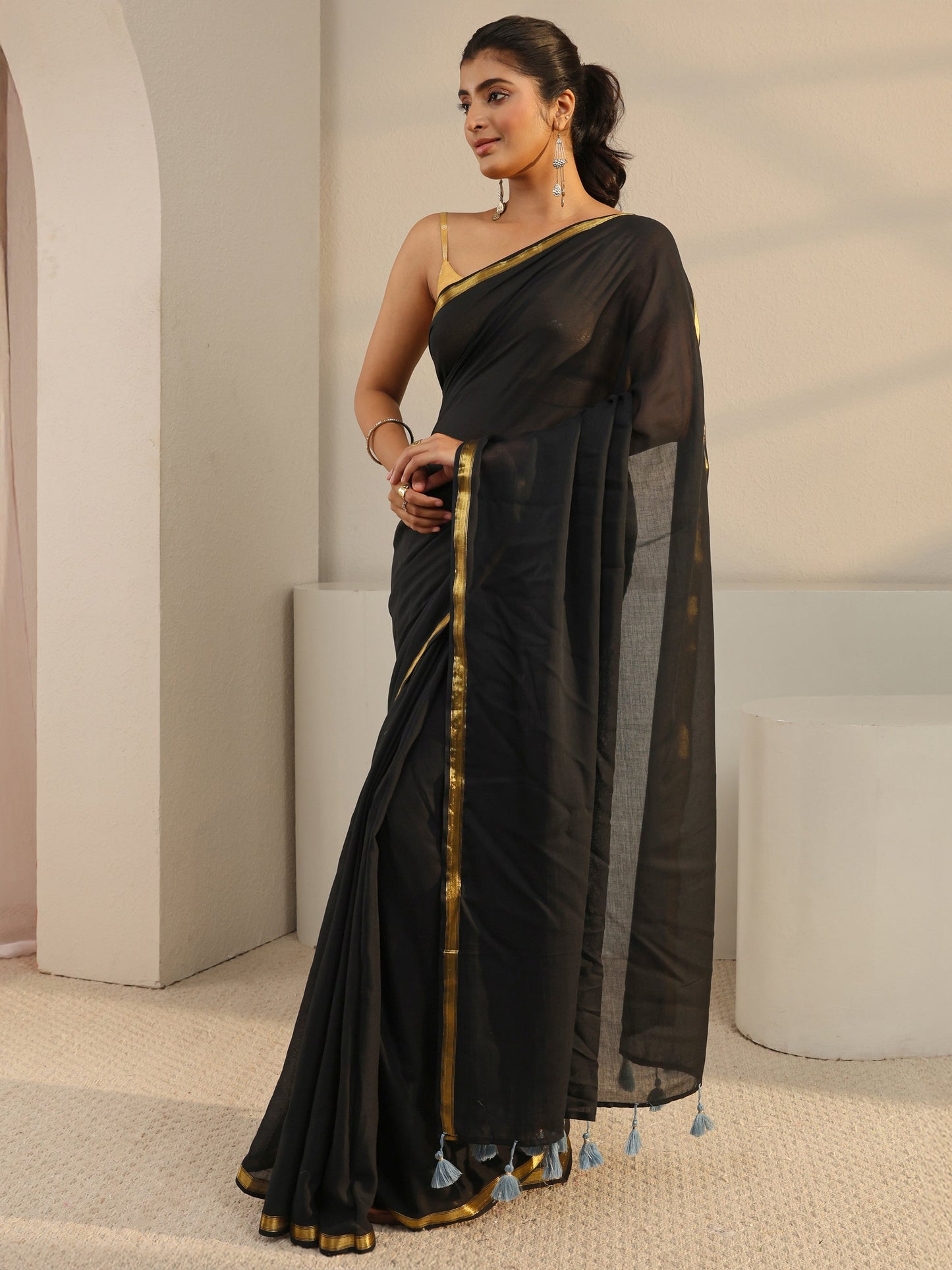 Libas Black Solid Cotton Tassel Saree