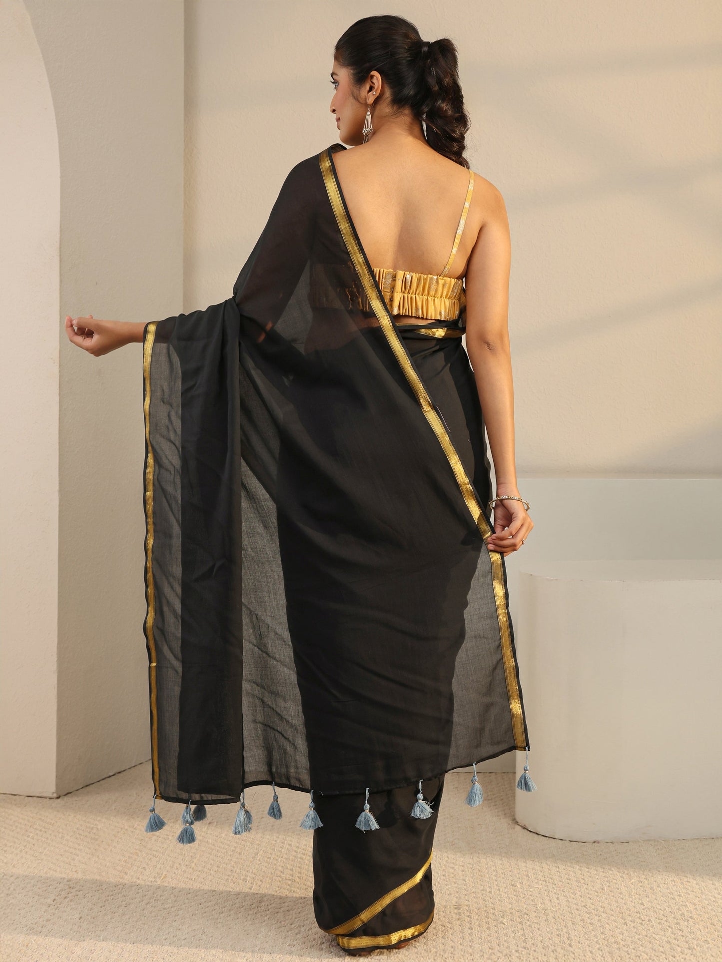 Libas Black Solid Cotton Tassel Saree