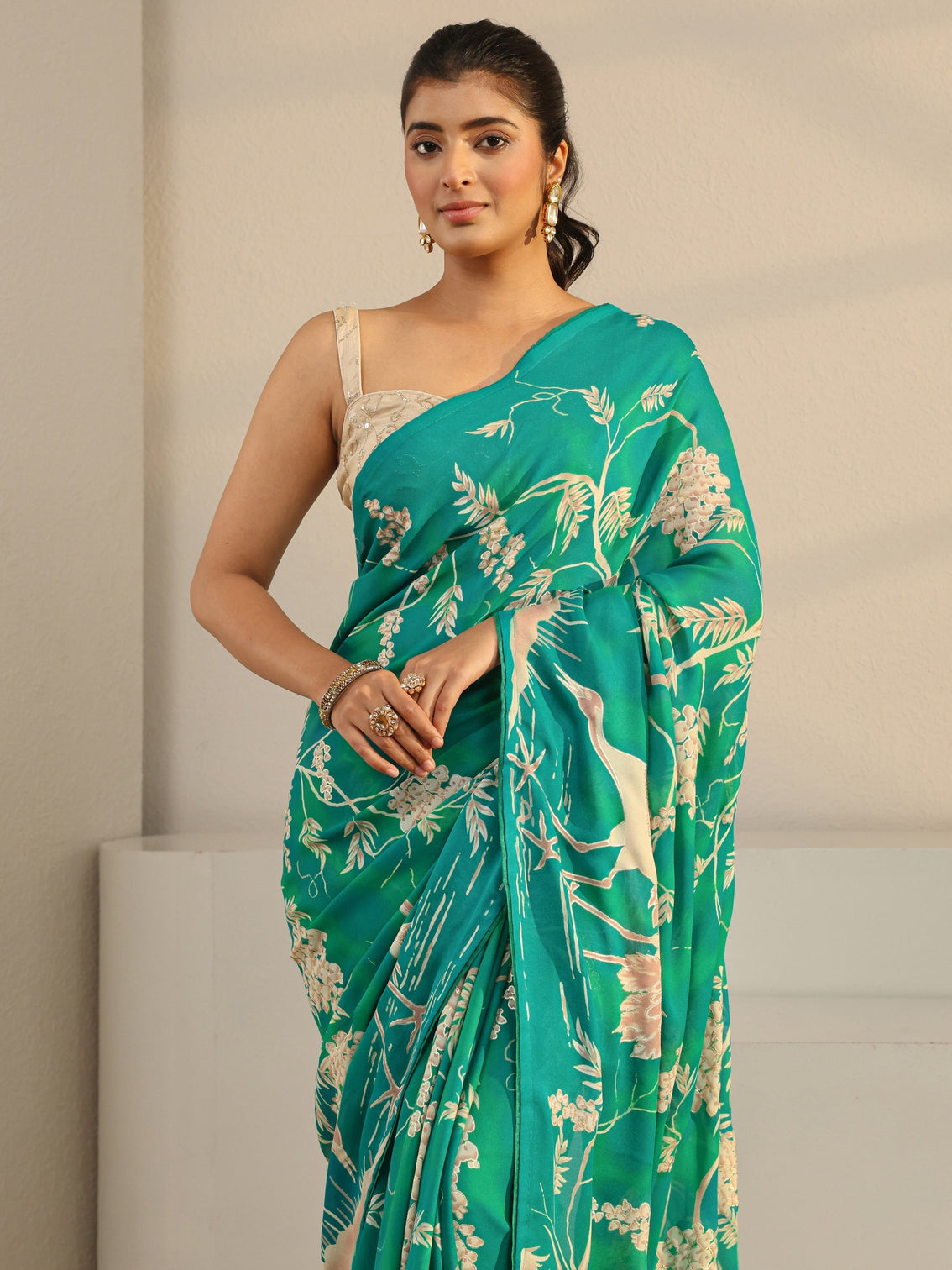 Mameraa Green Floral Printed Georgette Tassel Saree With Unstitched Blouse Piece