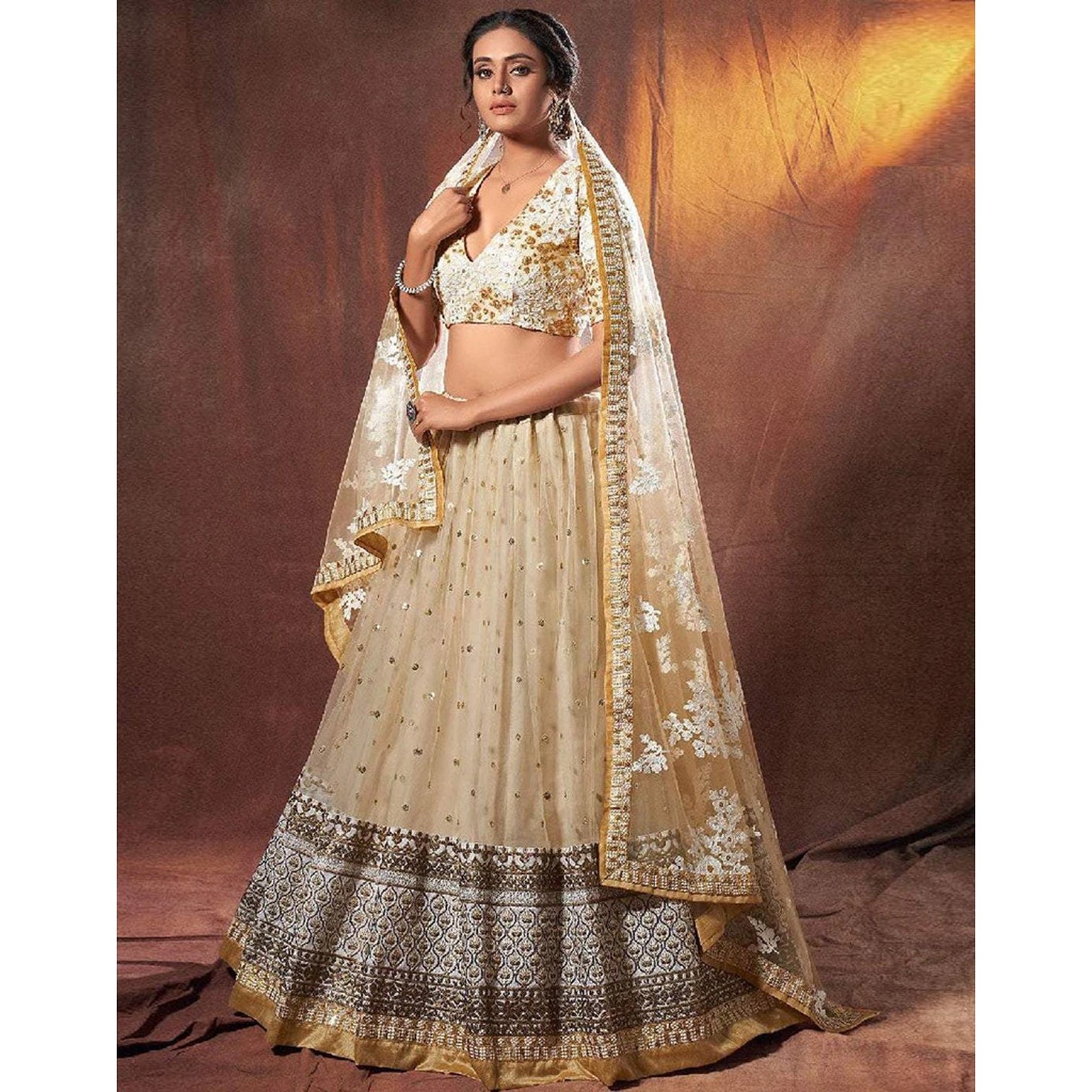 Beige Colored Lehenga Choli with Resham, Zari, and Sequence Work