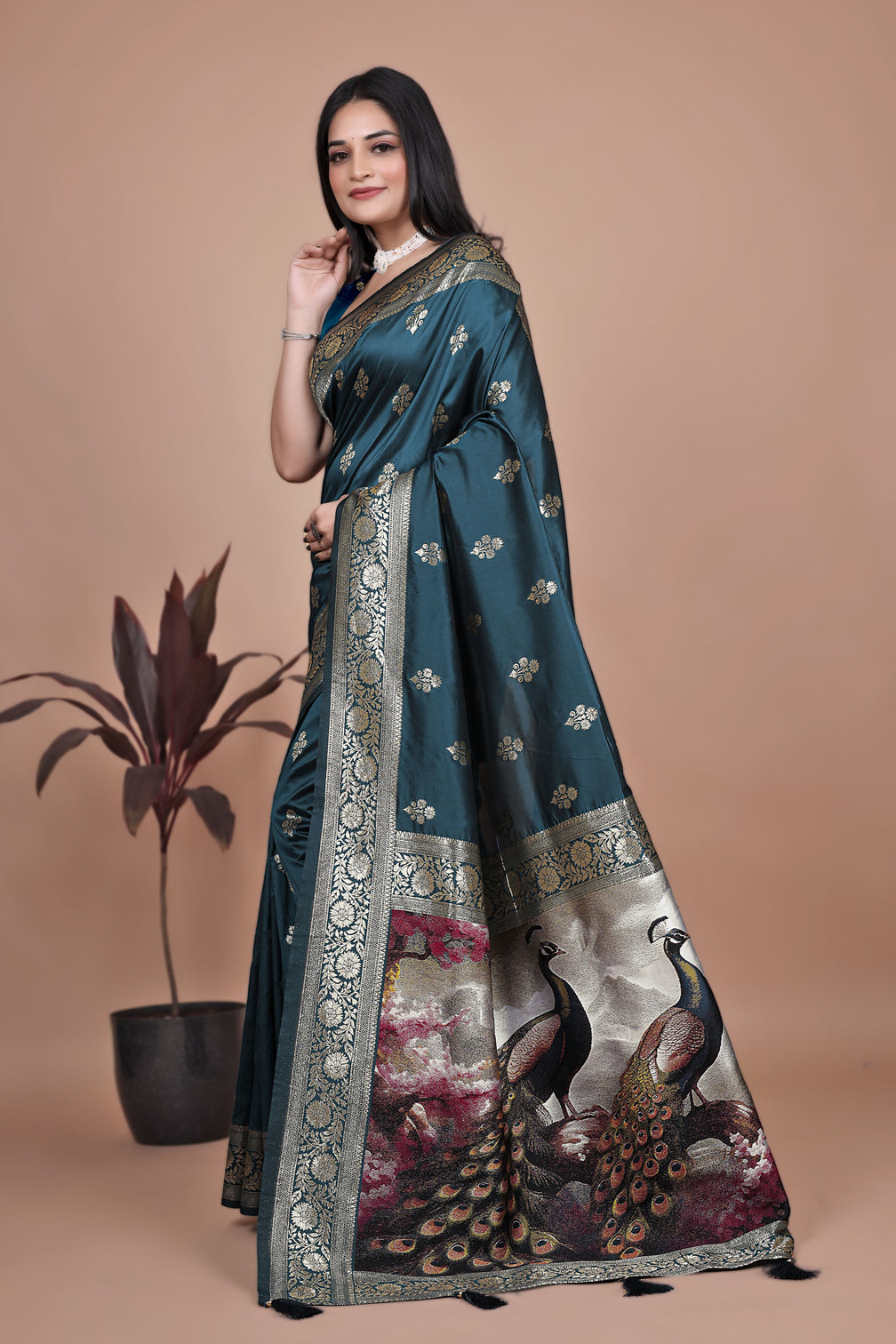 Graceful Teal Saree with Peacock Border and Silver Zari for Weddings & Festivals