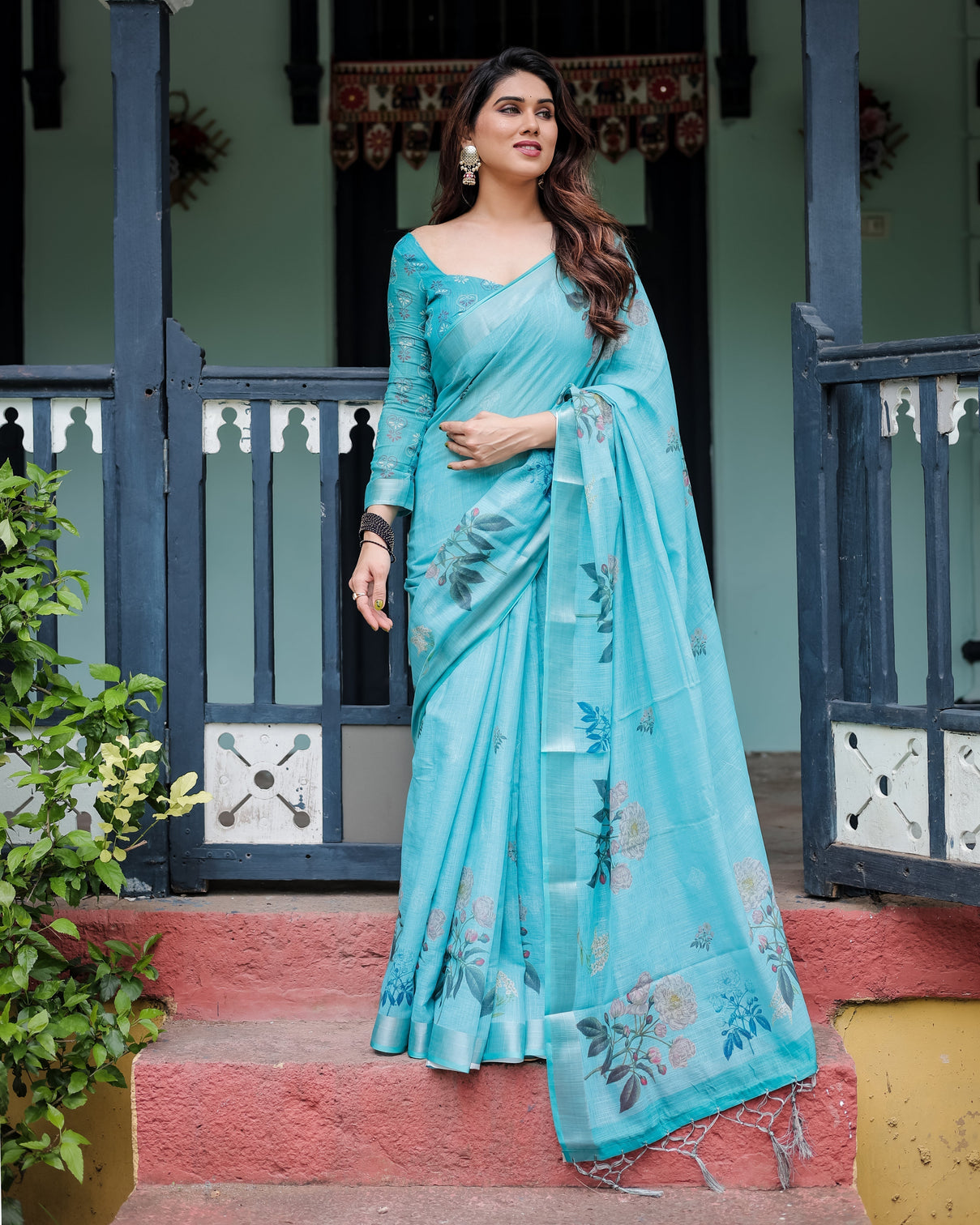 Aqua blue pure cotton linen saree with floral design blouse and tassel detailing mameraa