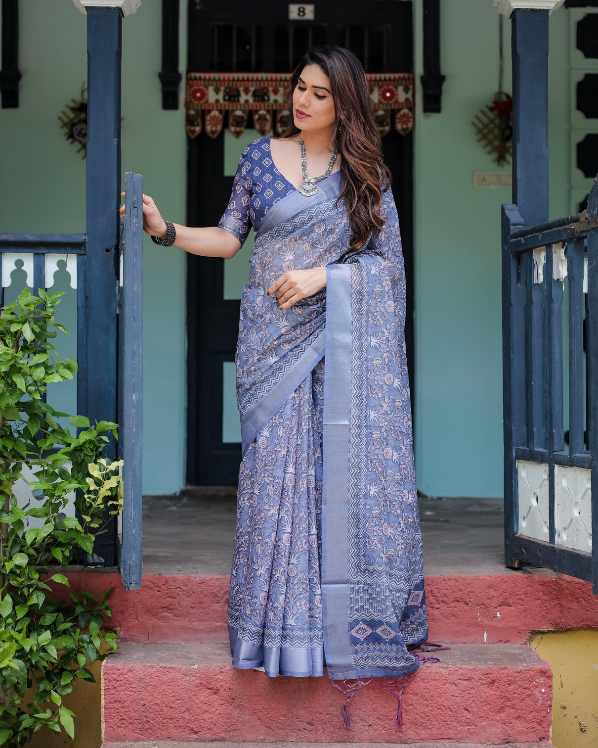 Steel blue pure cotton linen saree with floral and geometric block print blouse and tassel detailing