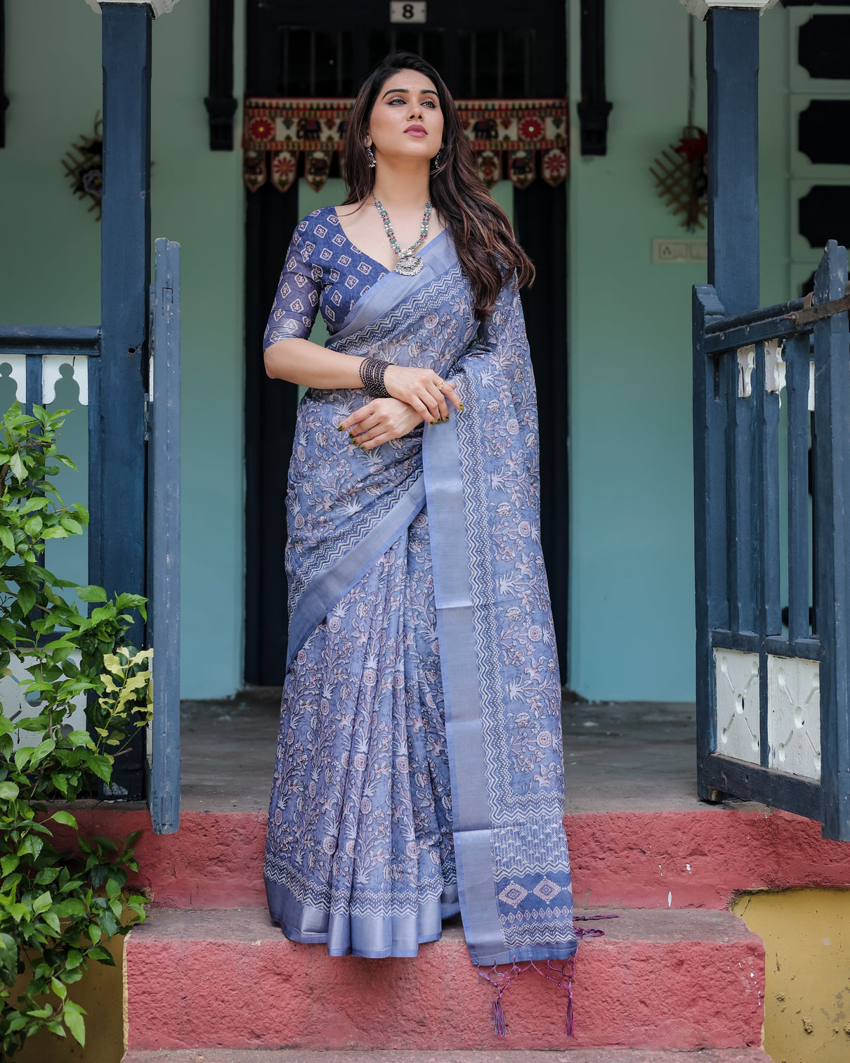 Steel blue pure cotton linen saree with floral and geometric block print blouse and tassel detailing mameraa