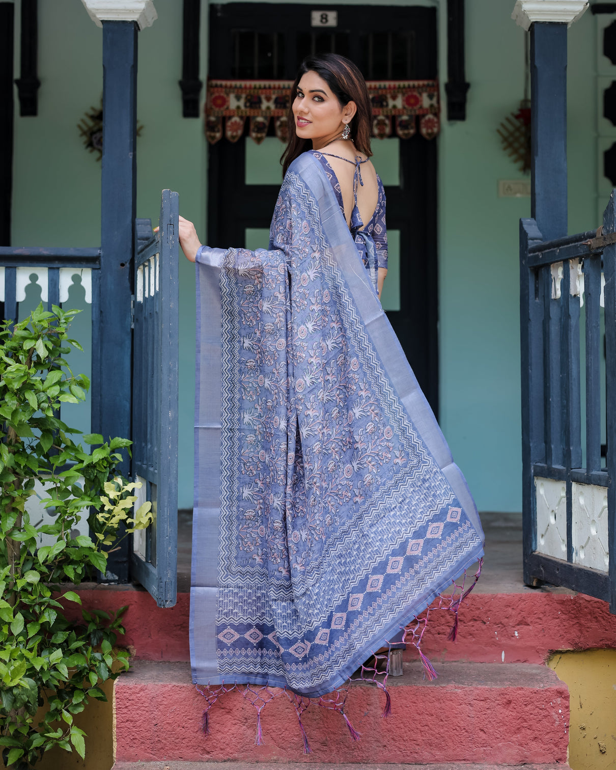 Steel blue pure cotton linen saree with floral and geometric block print blouse and tassel detailing