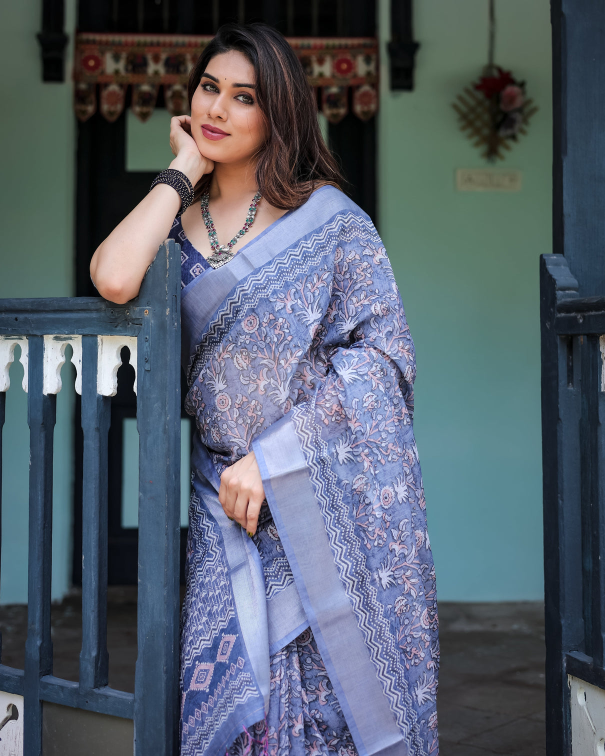 Steel blue pure cotton linen saree with floral and geometric block print blouse and tassel detailing
