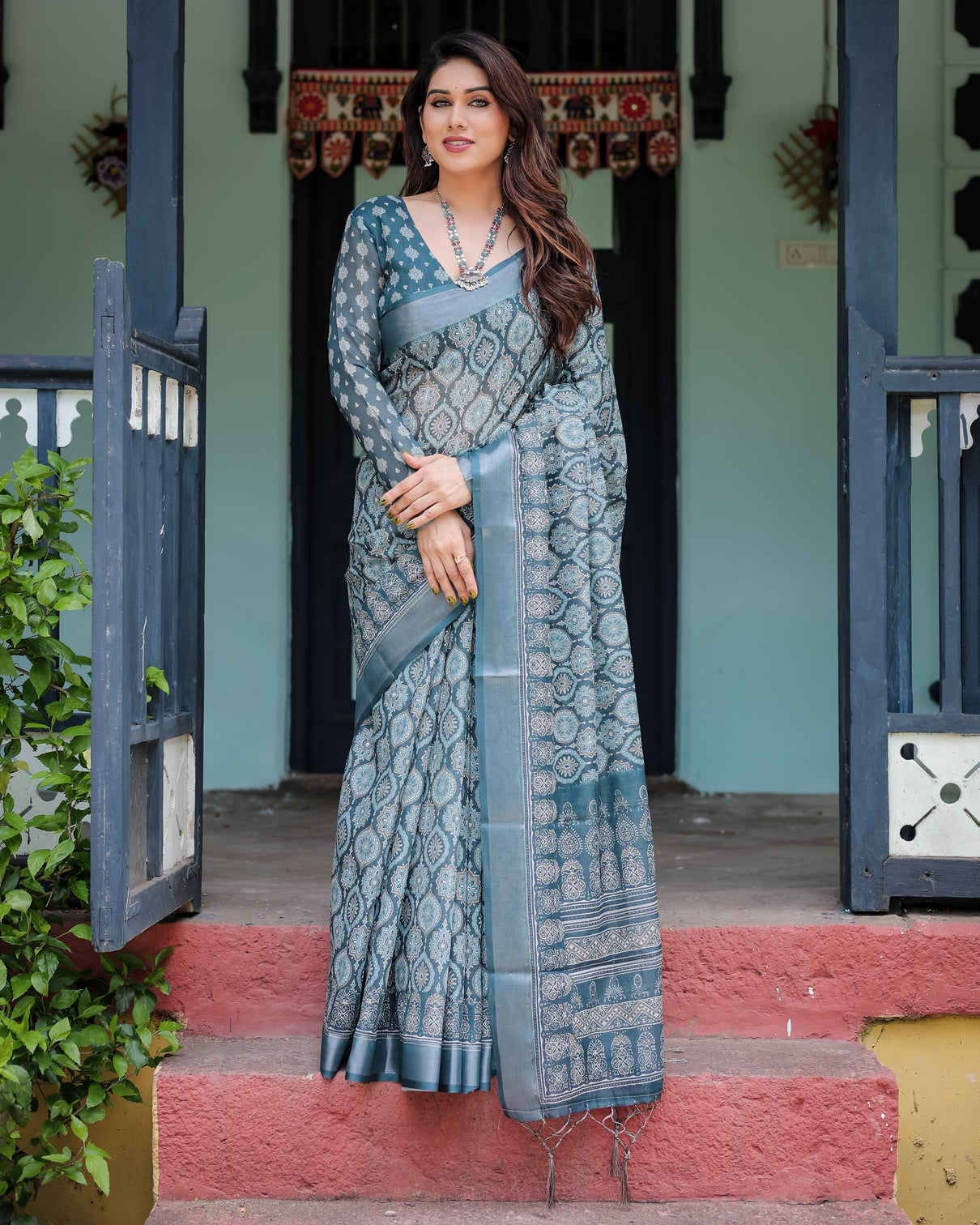Teal blue pure cotton linen saree with geometric block print blouse and tassel detailing mameraa