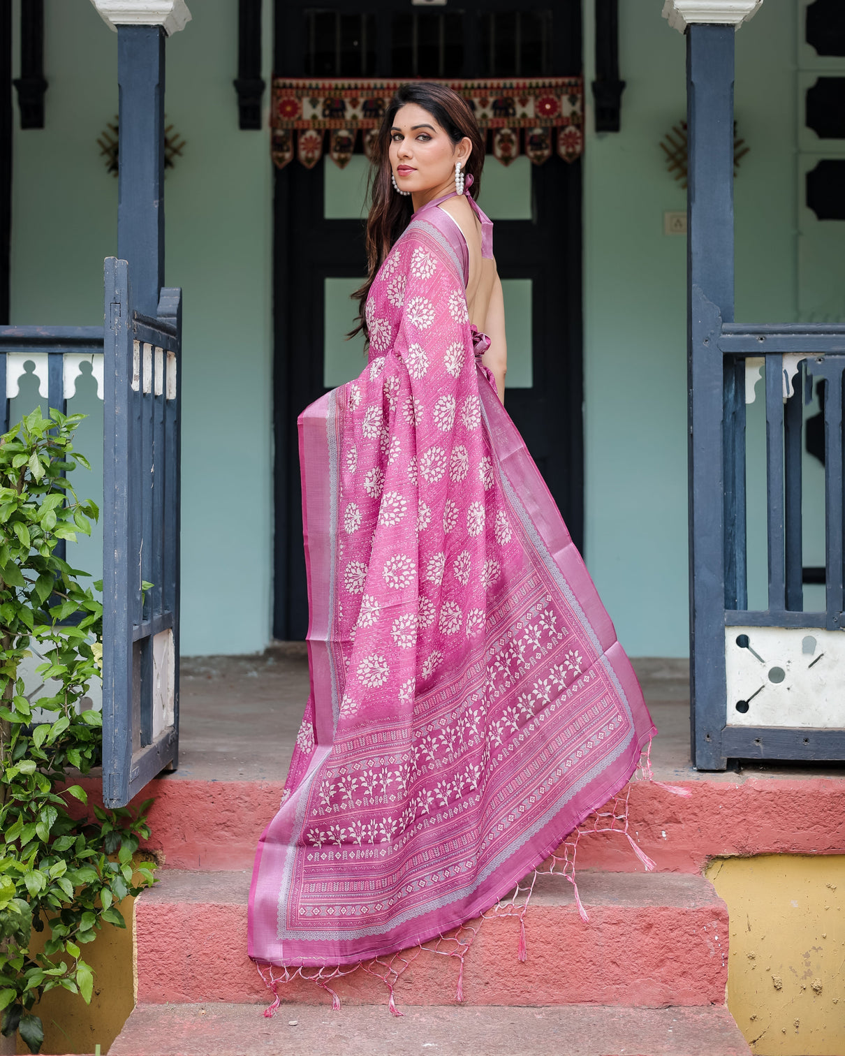 Magenta pure cotton linen saree with white floral block print blouse and tassel detailing