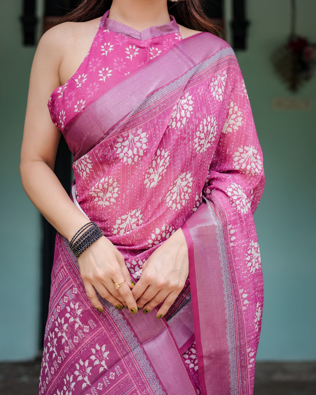 Magenta pure cotton linen saree with white floral block print blouse and tassel detailing