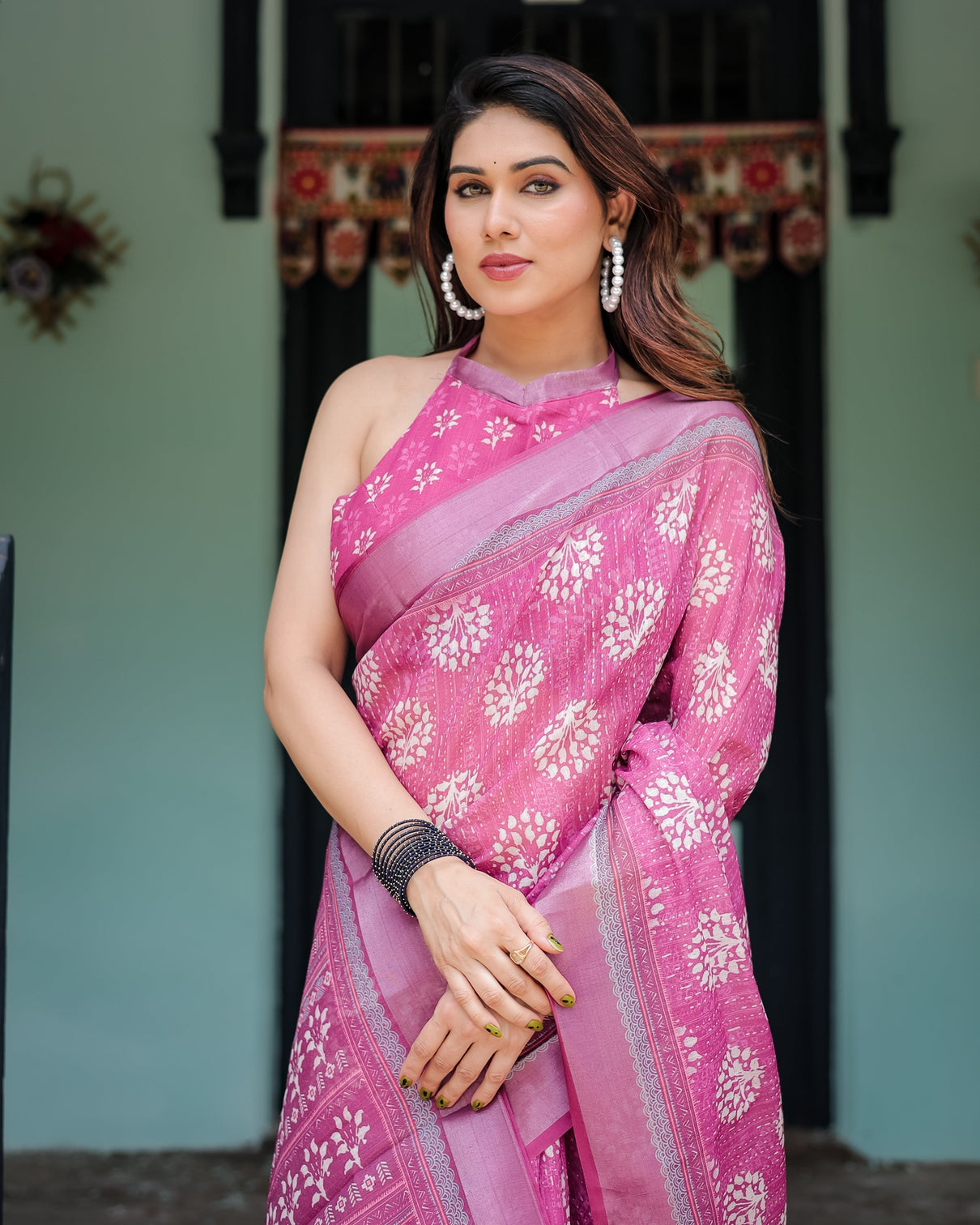 Magenta pure cotton linen saree with white floral block print blouse and tassel detailing