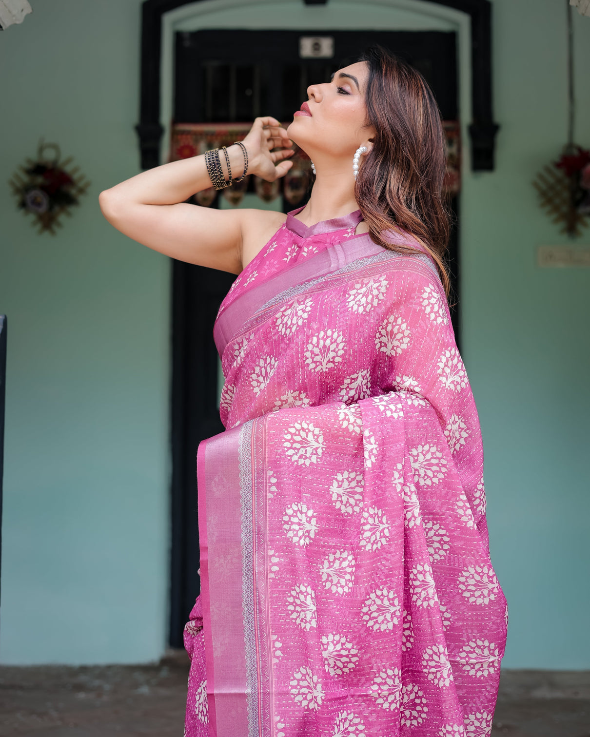 Magenta pure cotton linen saree with white floral block print blouse and tassel detailing