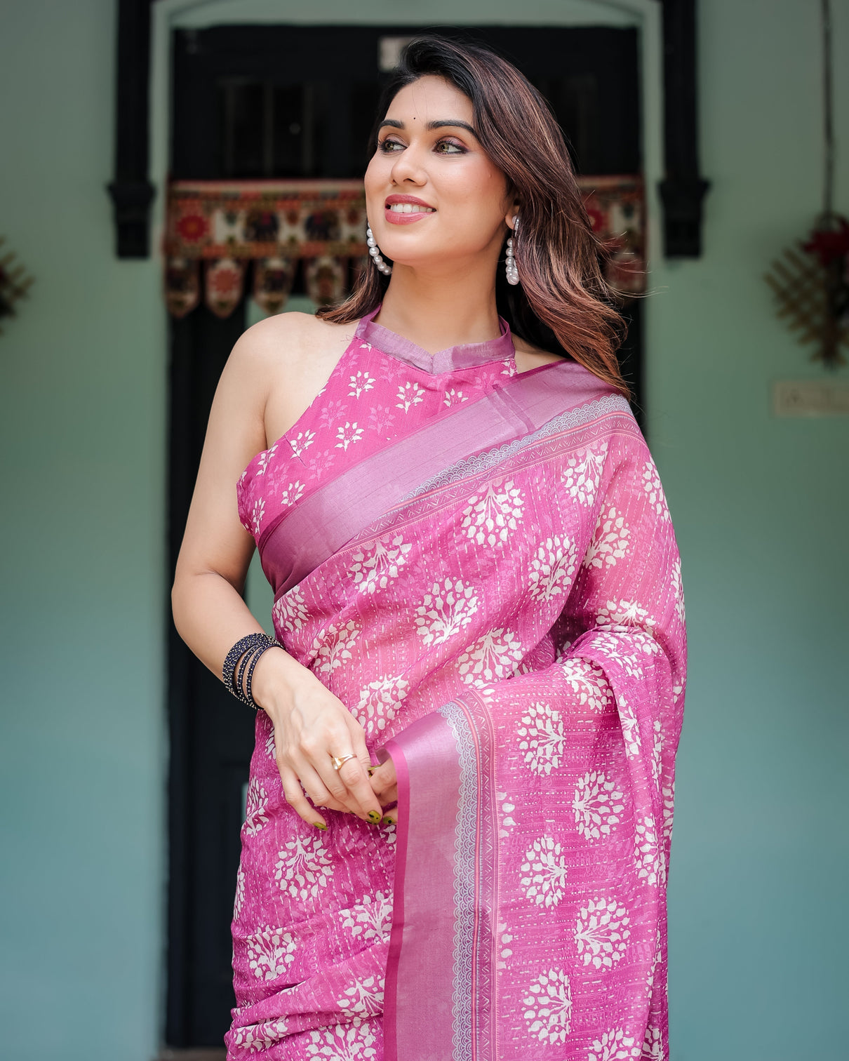 Magenta pure cotton linen saree with white floral block print blouse and tassel detailing