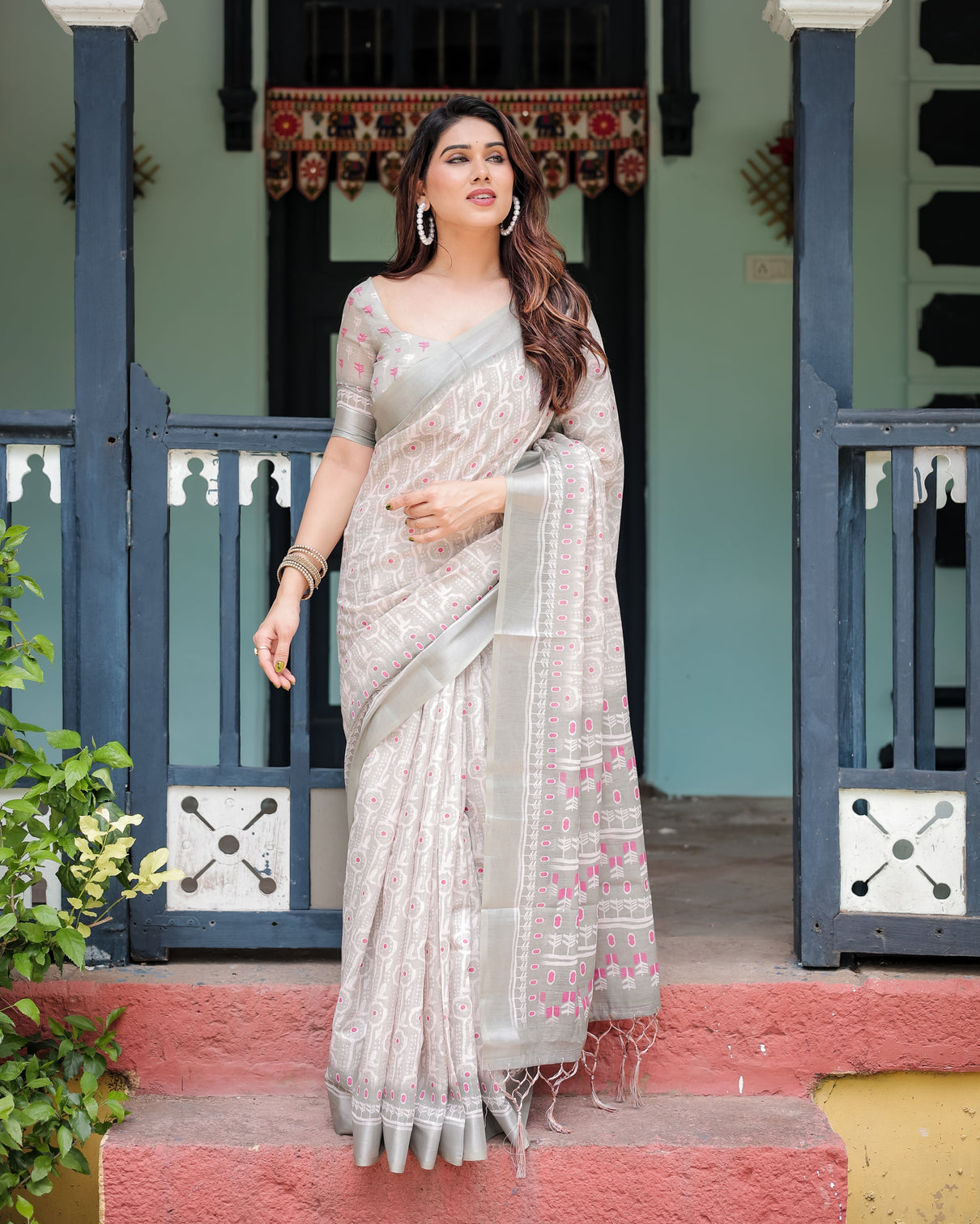 Soft grey pure cotton linen saree with pink and white ikat design blouse and tassel detailing mameraa
