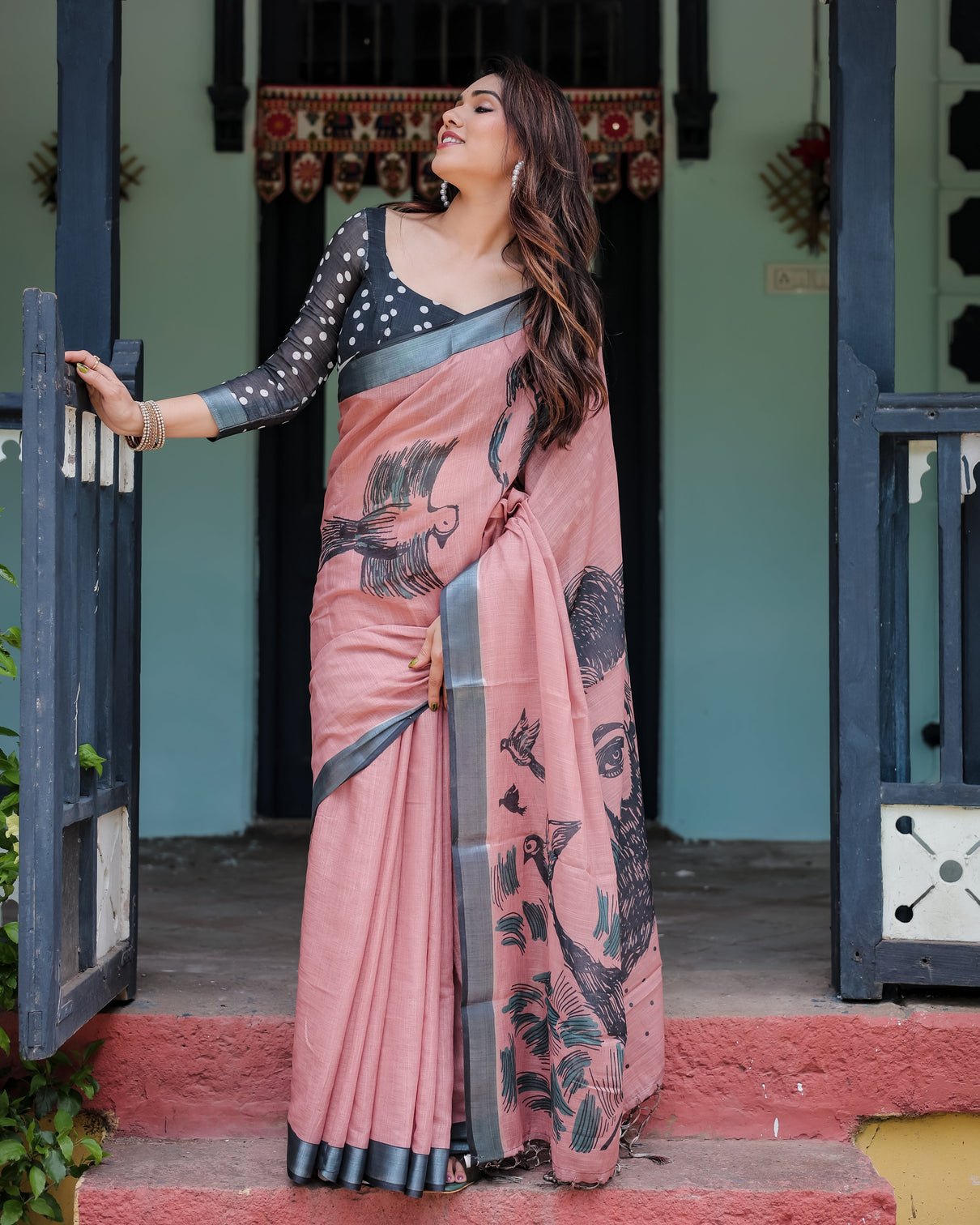 Blush pink pure cotton linen saree with contrast polka dot blouse and tassel detailing