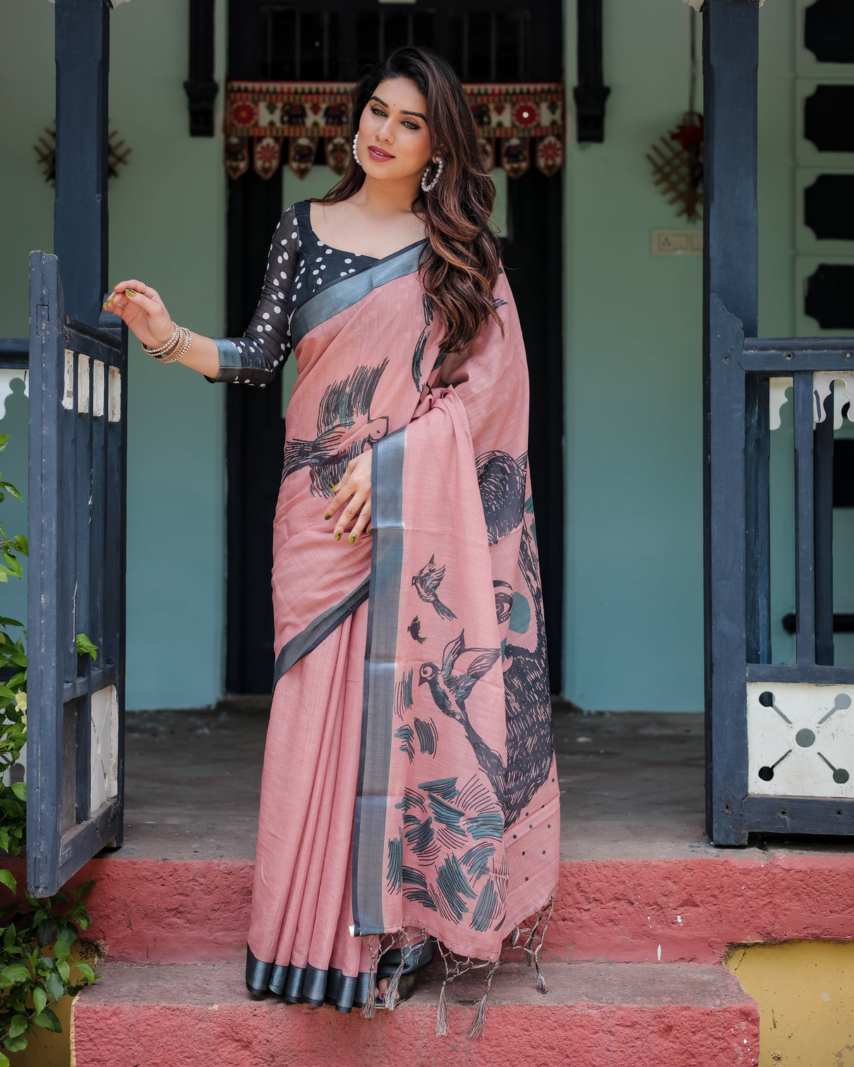Blush pink pure cotton linen saree with contrast polka dot blouse and tassel detailing