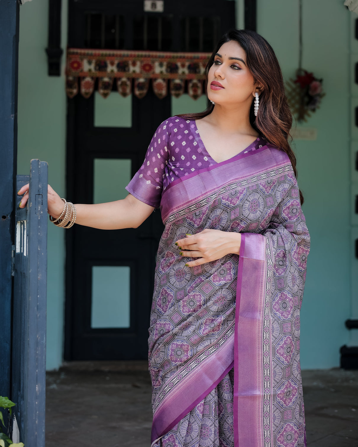 Elegant purple cotton linen saree with geometric motif and blouse