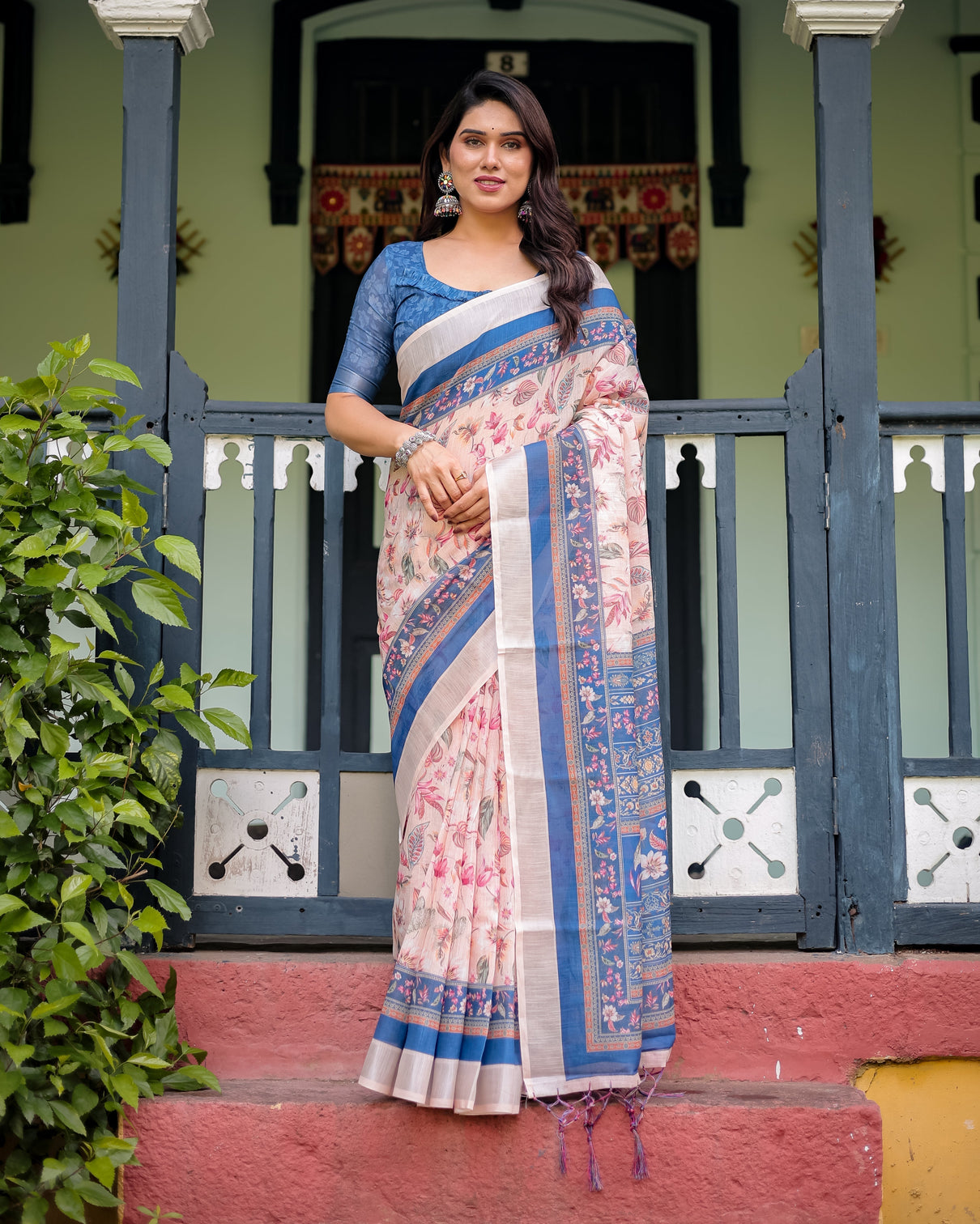Pure cotton linen saree with blue floral border and pink leaf design with tassels on edges mameraa