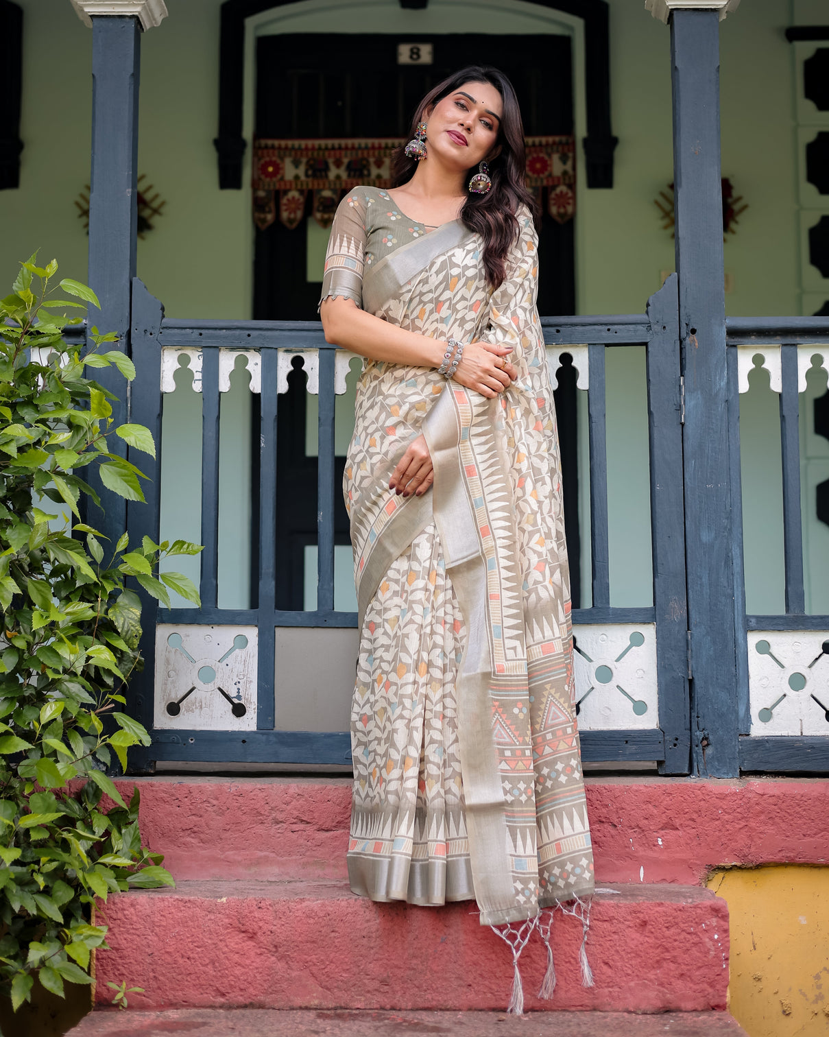 Beige pure cotton linen saree with geometric and leaf pattern blouse and tassels