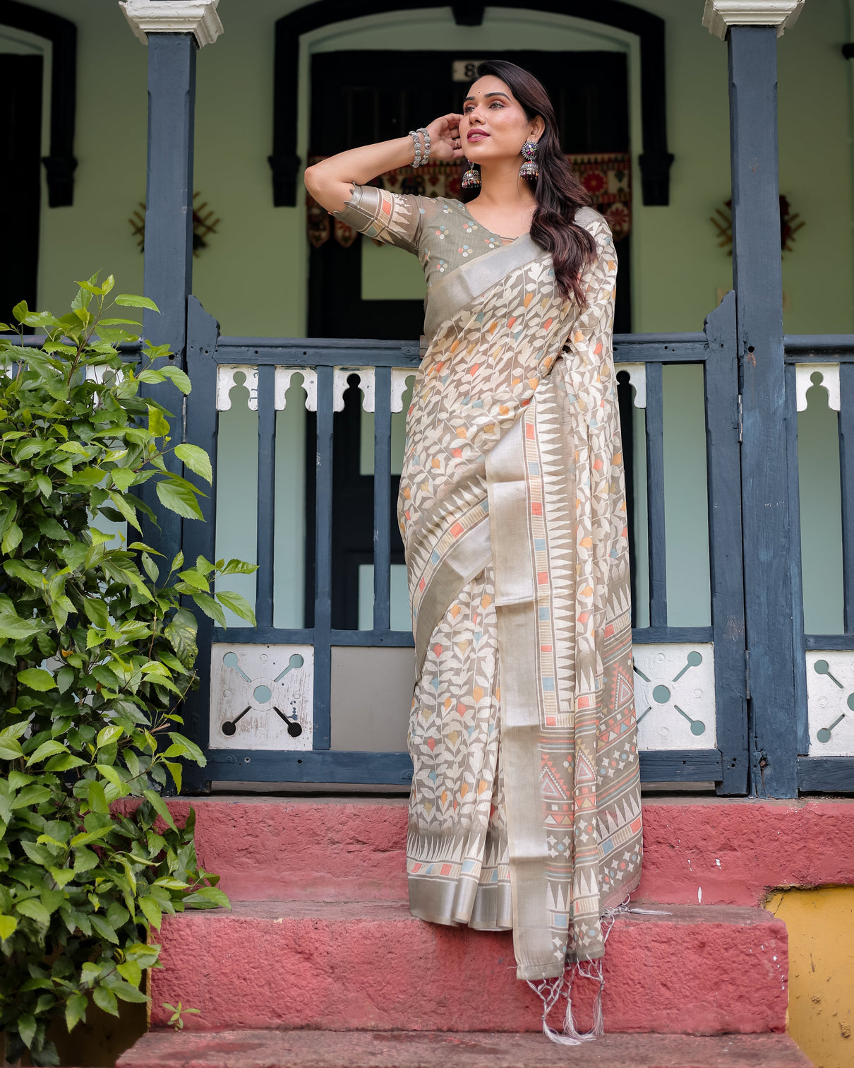 Beige pure cotton linen saree with geometric and leaf pattern blouse and tassels