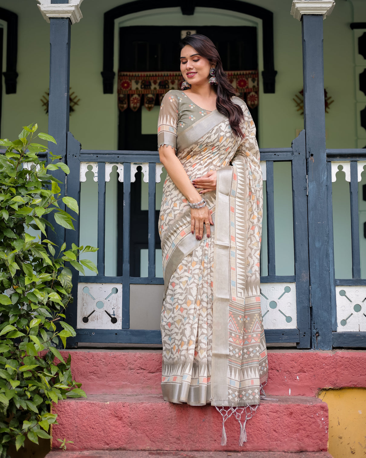 Beige pure cotton linen saree with geometric and leaf pattern blouse and tassels