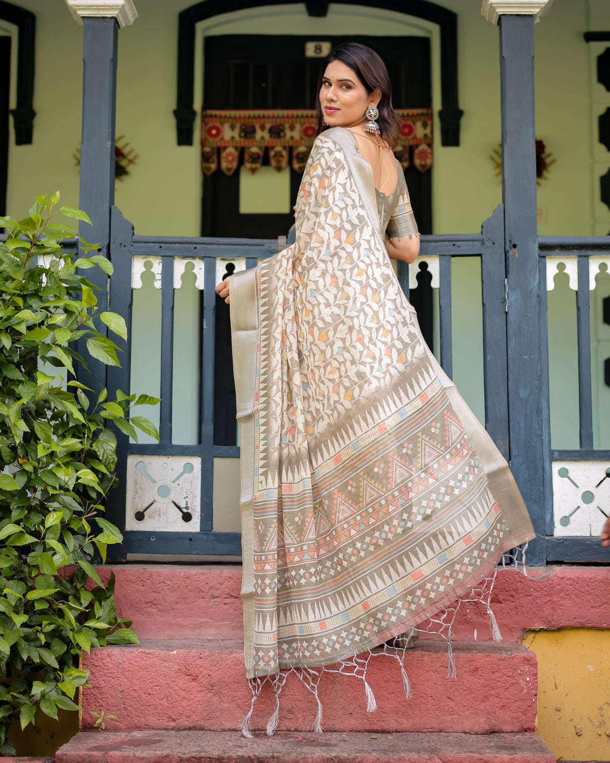 Beige pure cotton linen saree with geometric and leaf pattern blouse and tassels