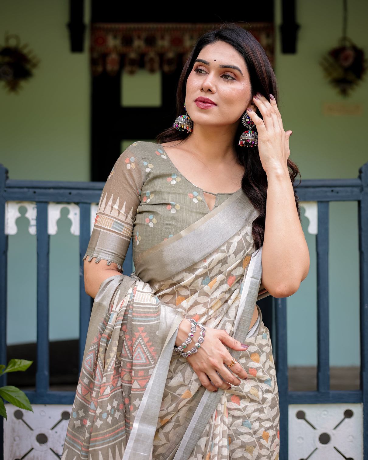 Beige pure cotton linen saree with geometric and leaf pattern blouse and tassels