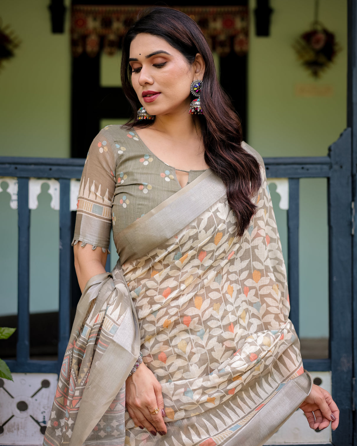Beige pure cotton linen saree with geometric and leaf pattern blouse and tassels