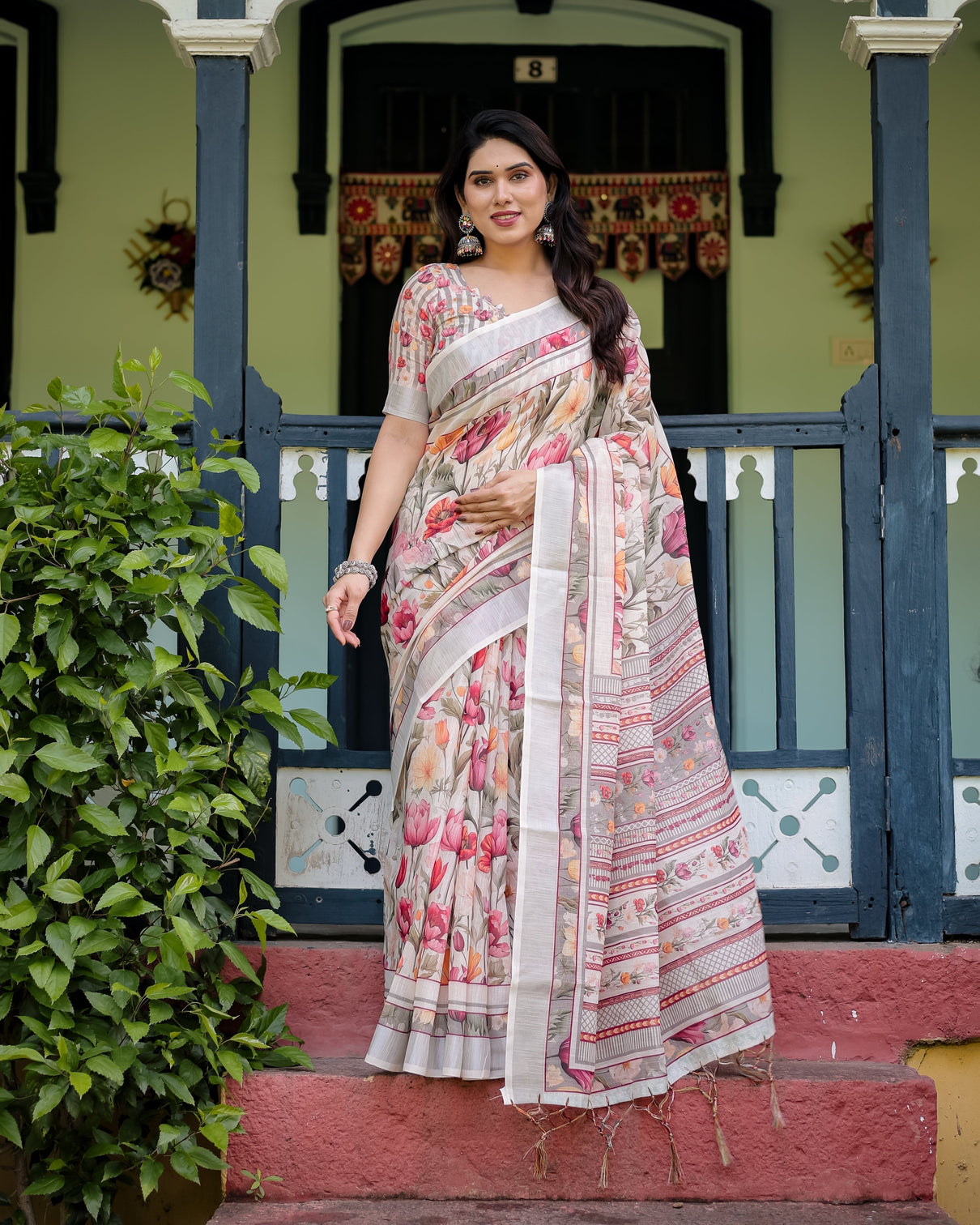 Elegant floral print pure cotton linen saree in ivory with multi color florals and tassels mameraa