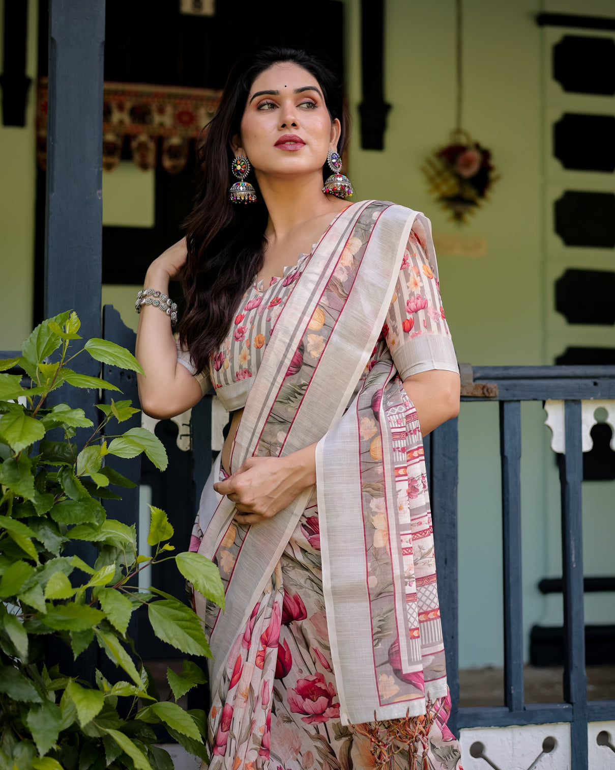 Elegant floral print pure cotton linen saree in ivory with multi color florals and tassels
