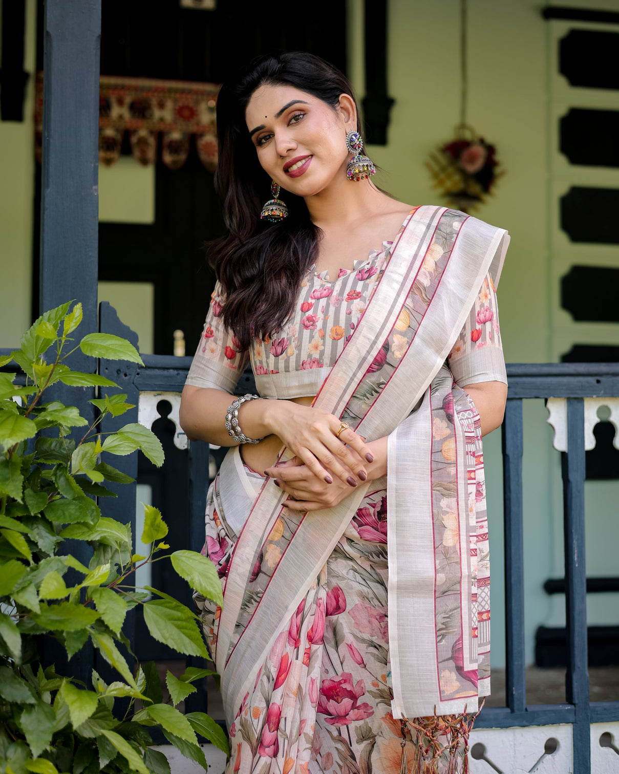 Elegant floral print pure cotton linen saree in ivory with multi color florals and tassels