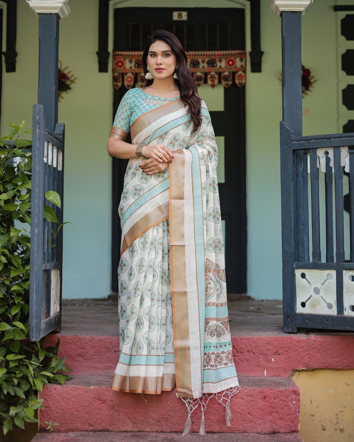 Beige with aqua pure cotton linen saree with geometric floral design and tassels on edges mameraa