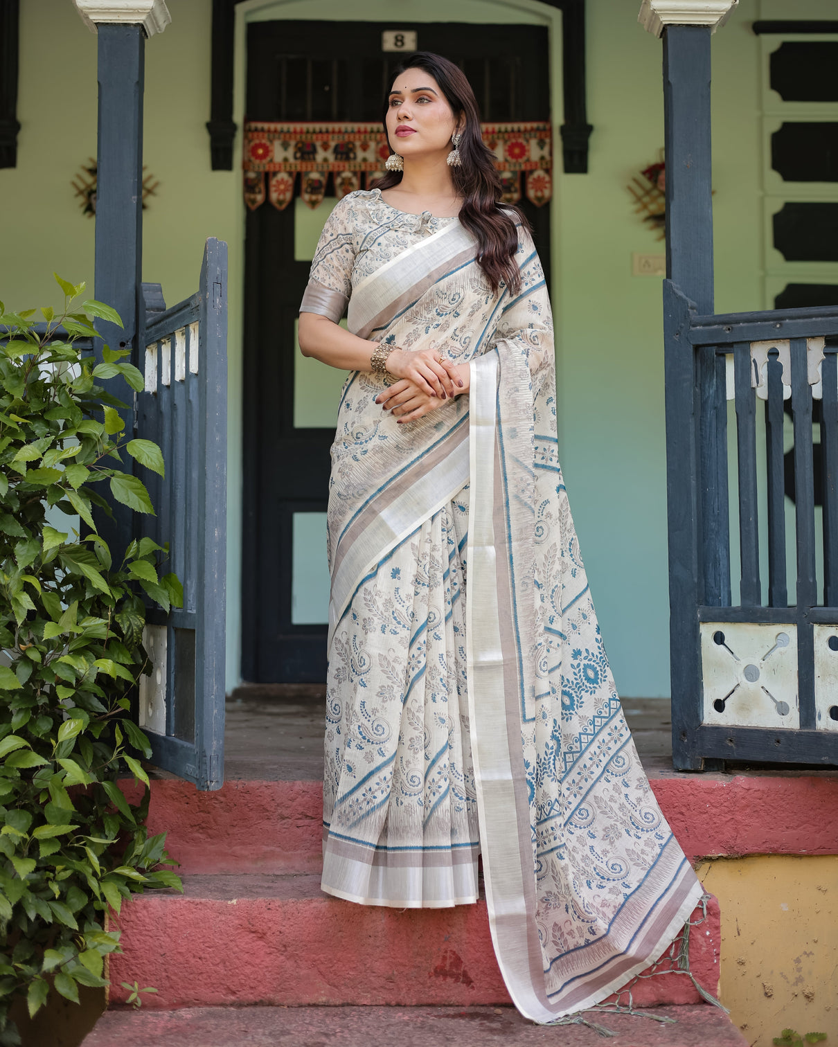 Beige and blue floral printed pure cotton linen saree with blouse and tassels