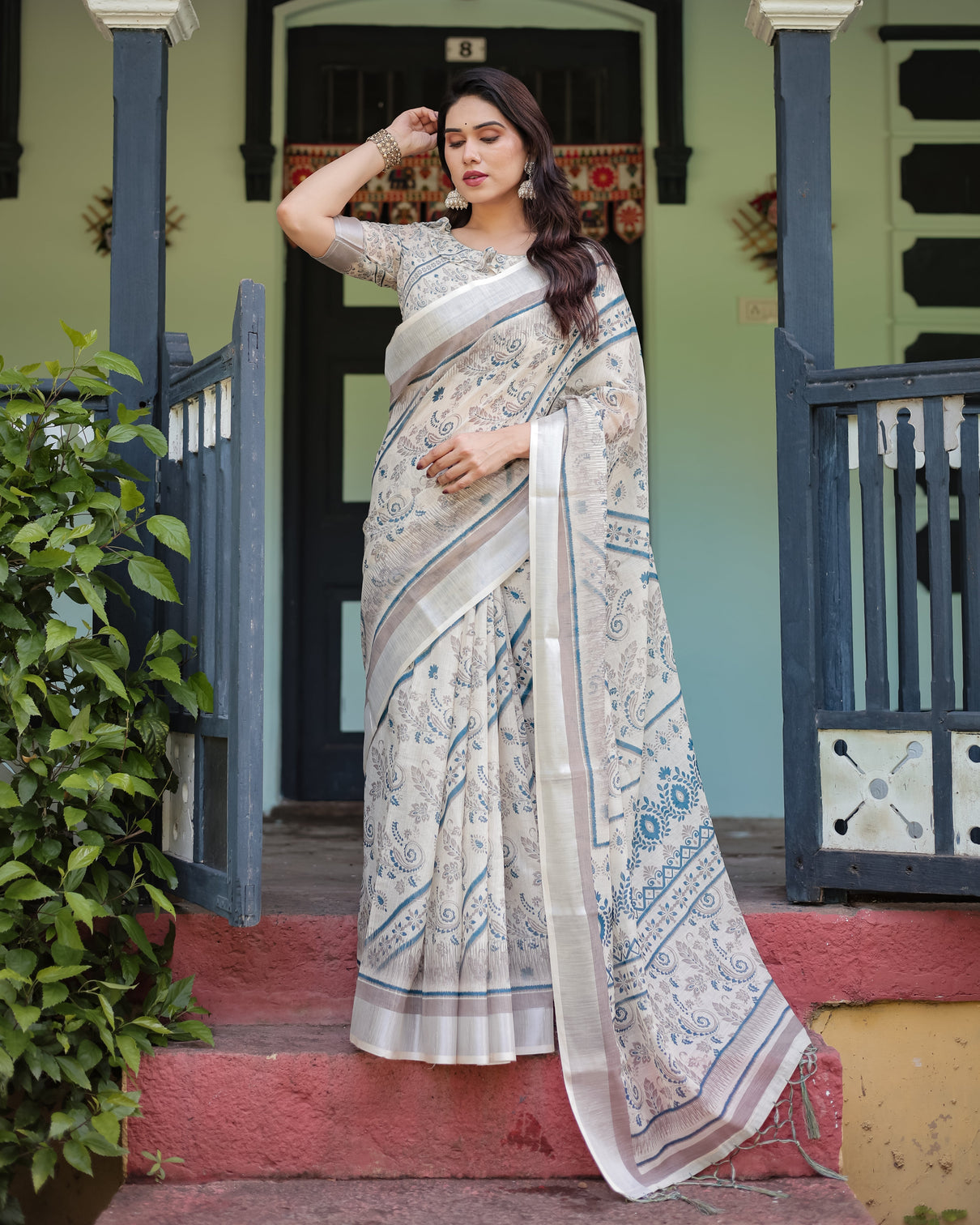 Beige and blue floral printed pure cotton linen saree with blouse and tassels