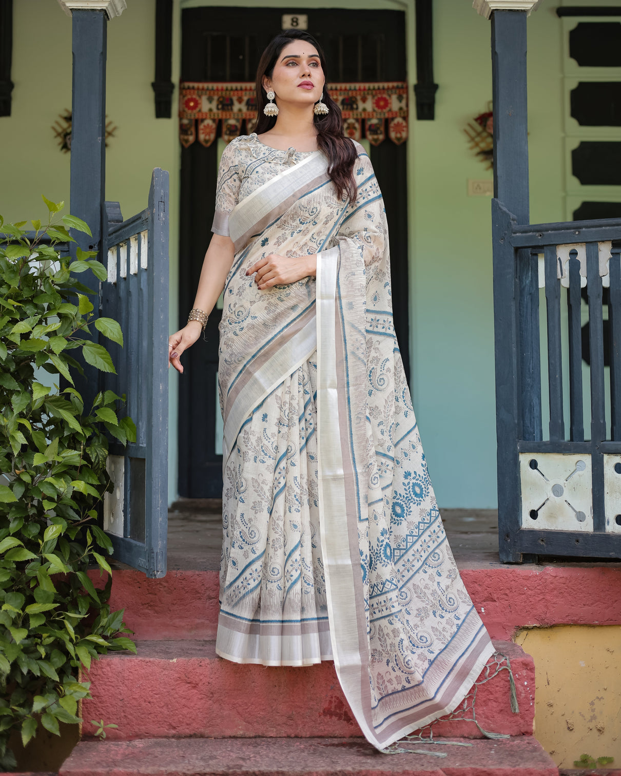 Beige and blue floral printed pure cotton linen saree with blouse and tassels